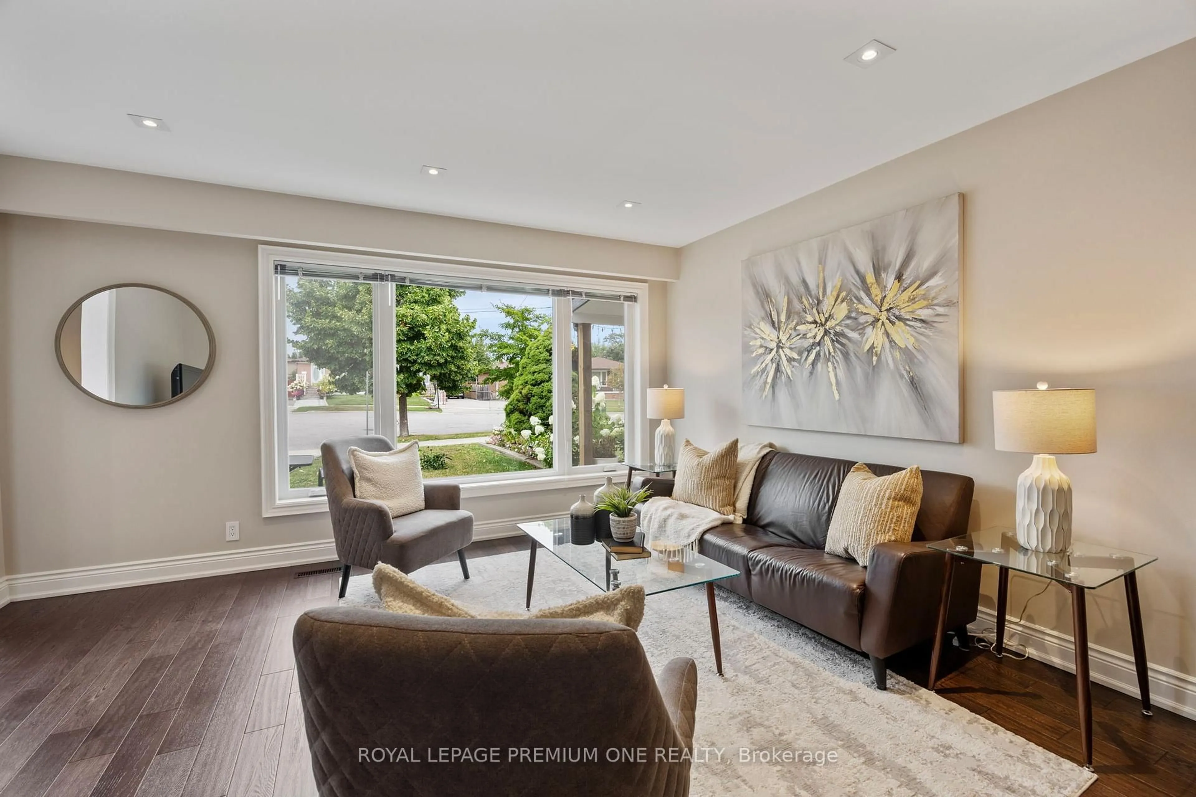 Living room with furniture, wood/laminate floor for 8 Buttercup Crt, Toronto Ontario M9L 2M9