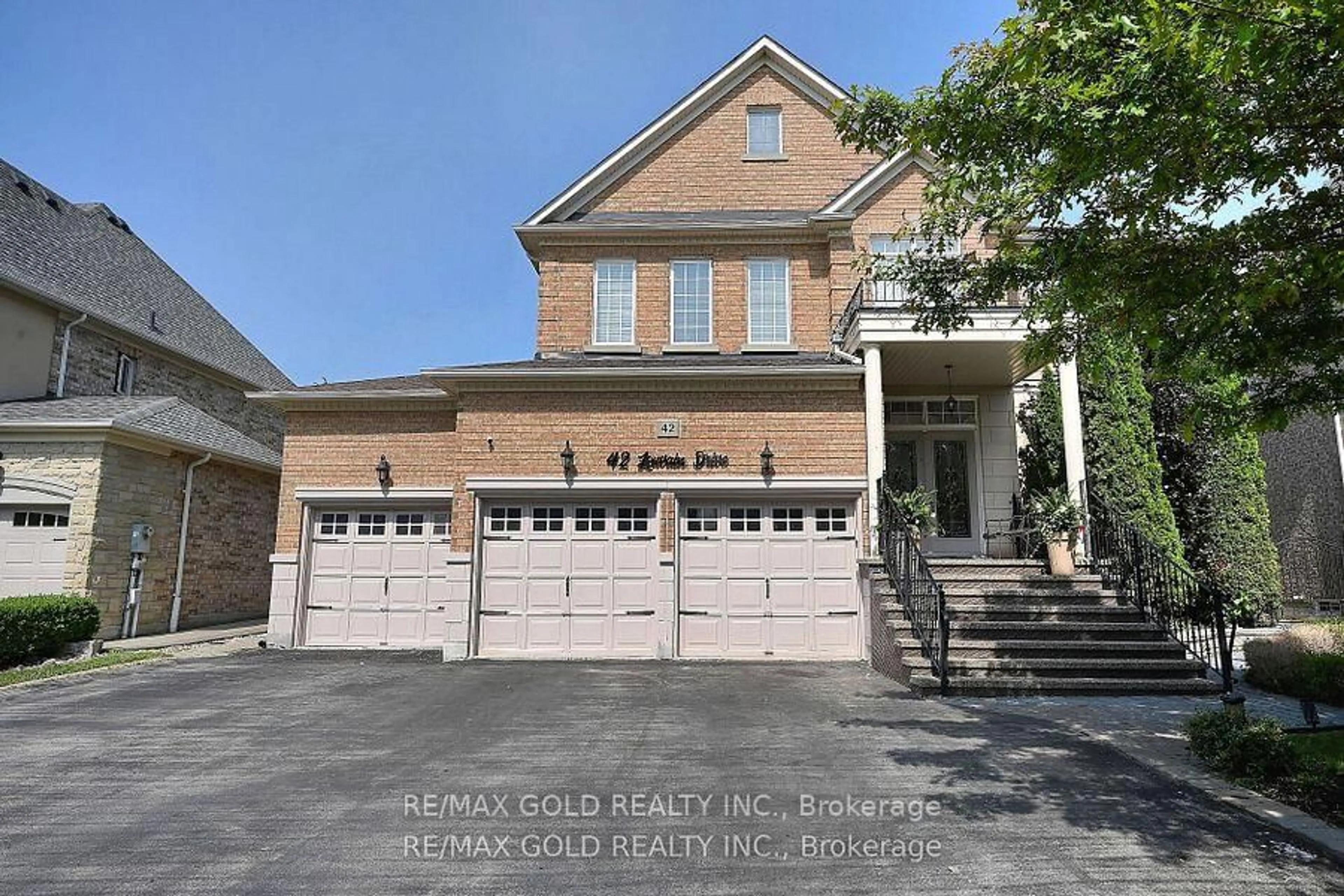 Home with brick exterior material, street for 42 Louvain Dr, Brampton Ontario L6P 1W7