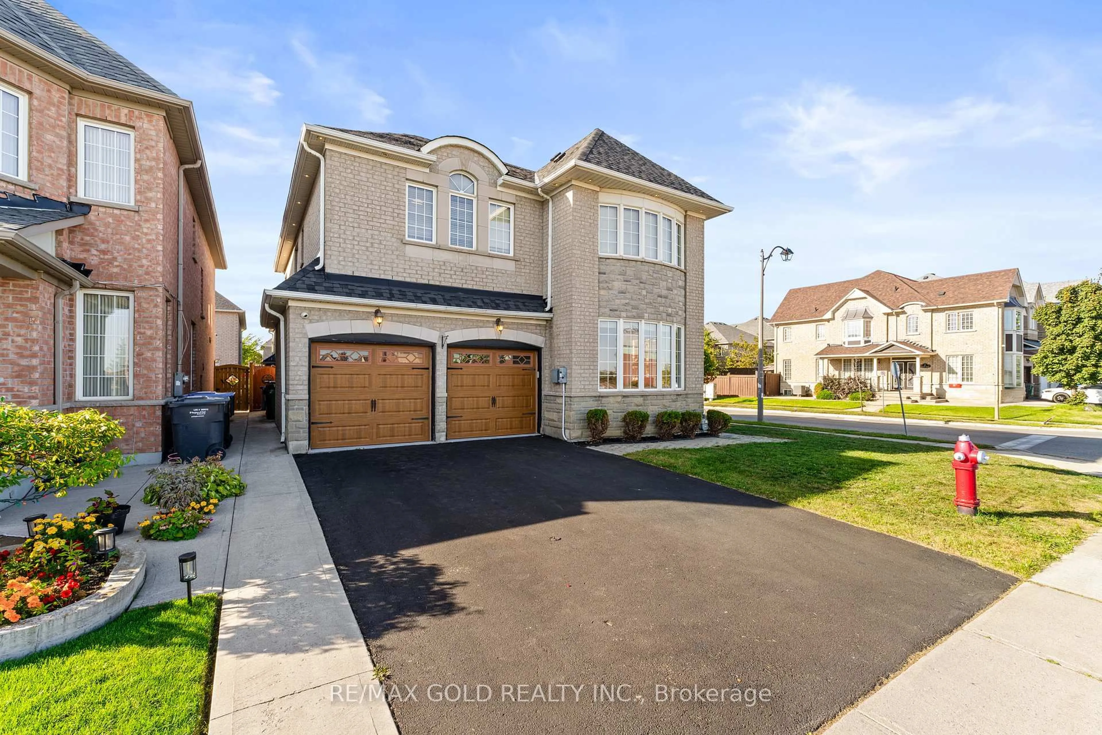 Home with vinyl exterior material, street for 2 Helman Rd, Brampton Ontario L6R 0R4