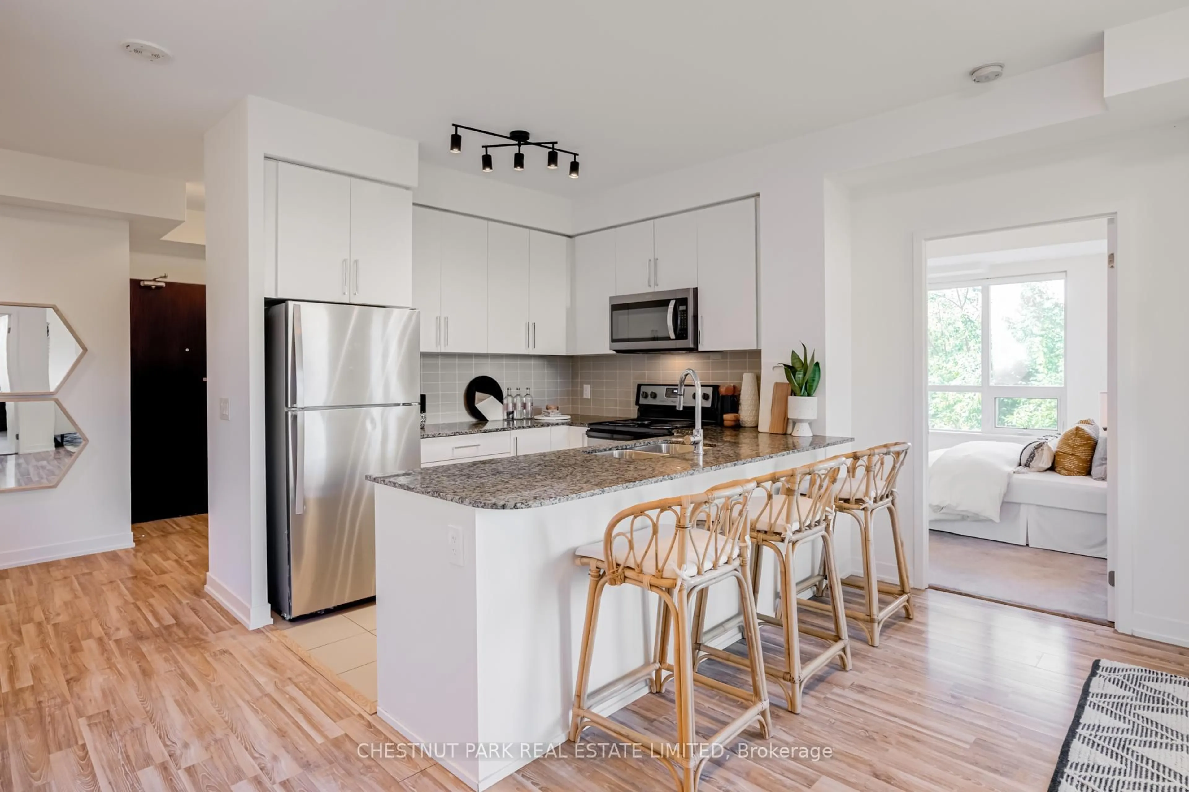 Open concept kitchen, unknown for 840 Queens Plate Dr #205, Toronto Ontario M9W 0E7