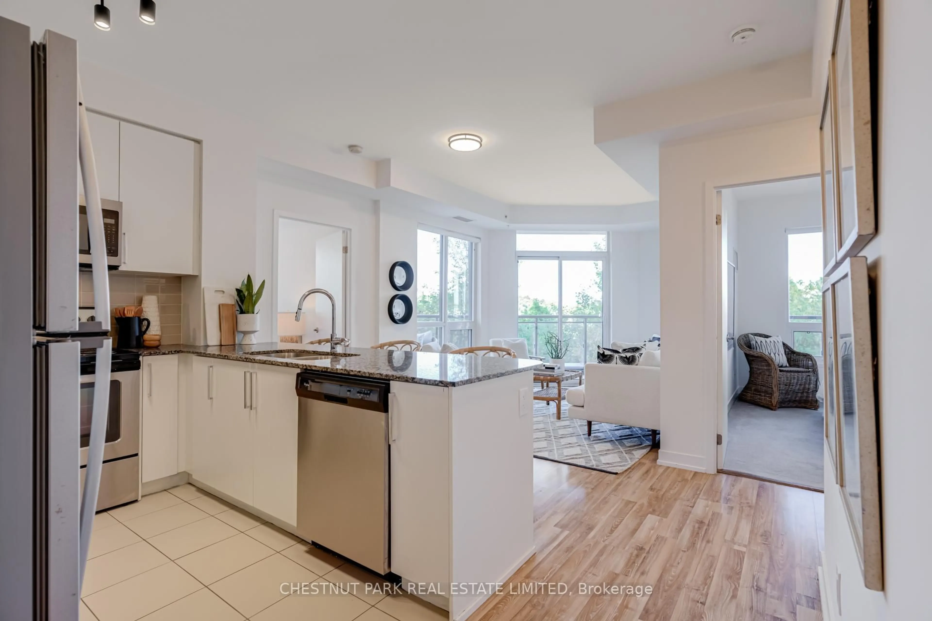 Open concept kitchen, ceramic/tile floor for 840 Queens Plate Dr #205, Toronto Ontario M9W 0E7
