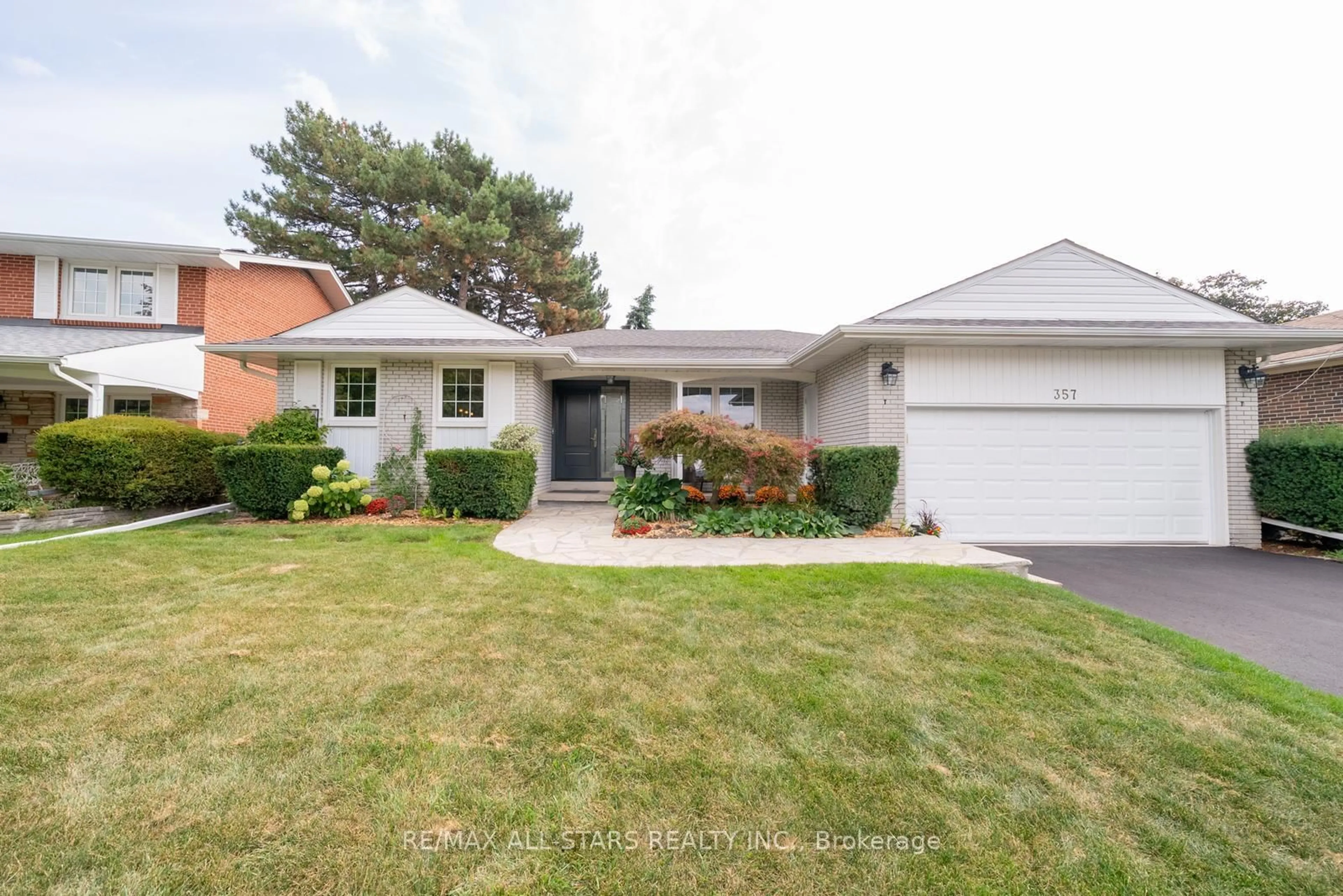 Home with brick exterior material, street for 357 Markland Dr, Toronto Ontario M9C 1S1
