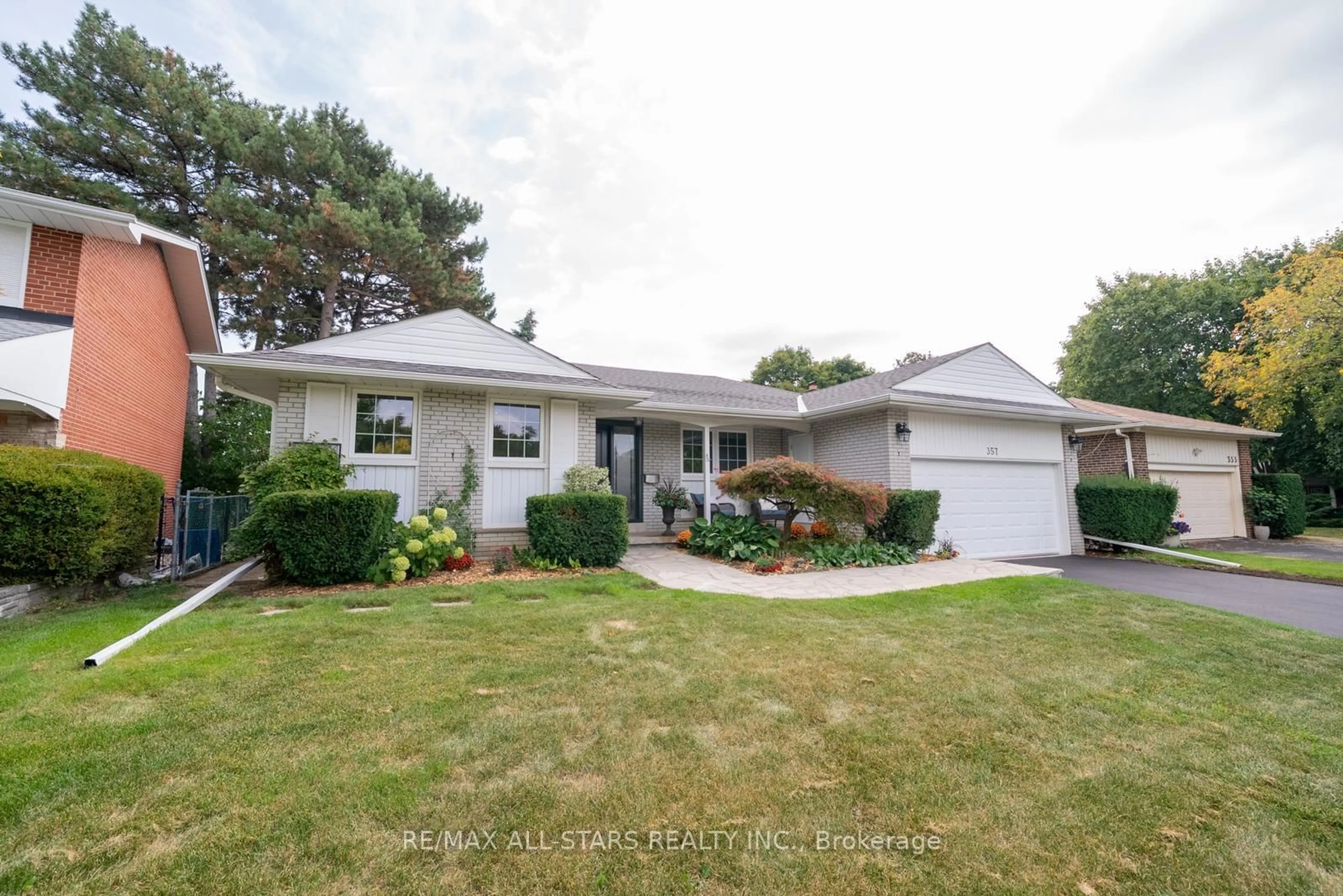Home with vinyl exterior material, street for 357 Markland Dr, Toronto Ontario M9C 1S1