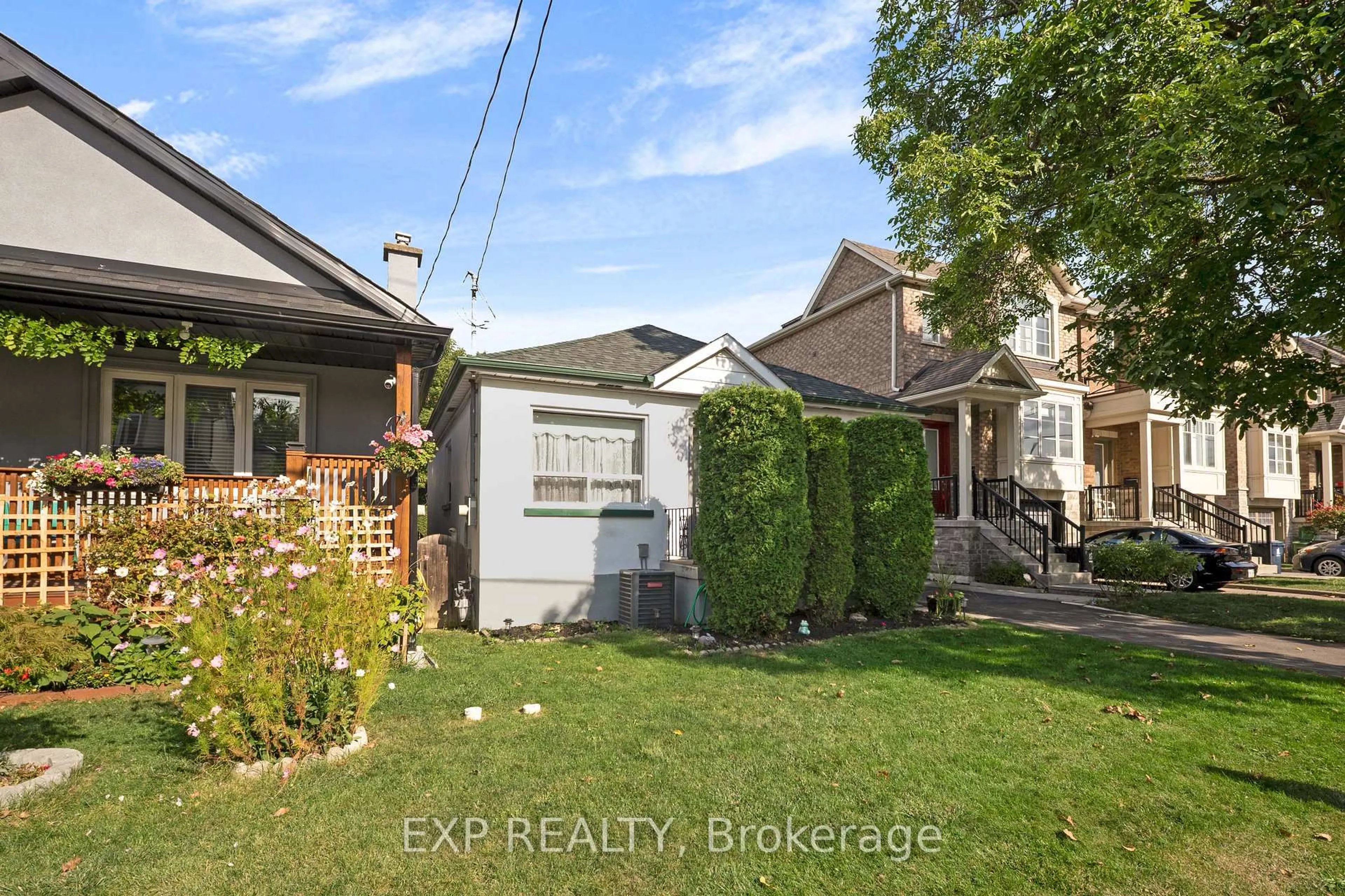 A pic from outside/outdoor area/front of a property/back of a property/a pic from drone, street for 79 Sixteenth St, Toronto Ontario M8V 3J9