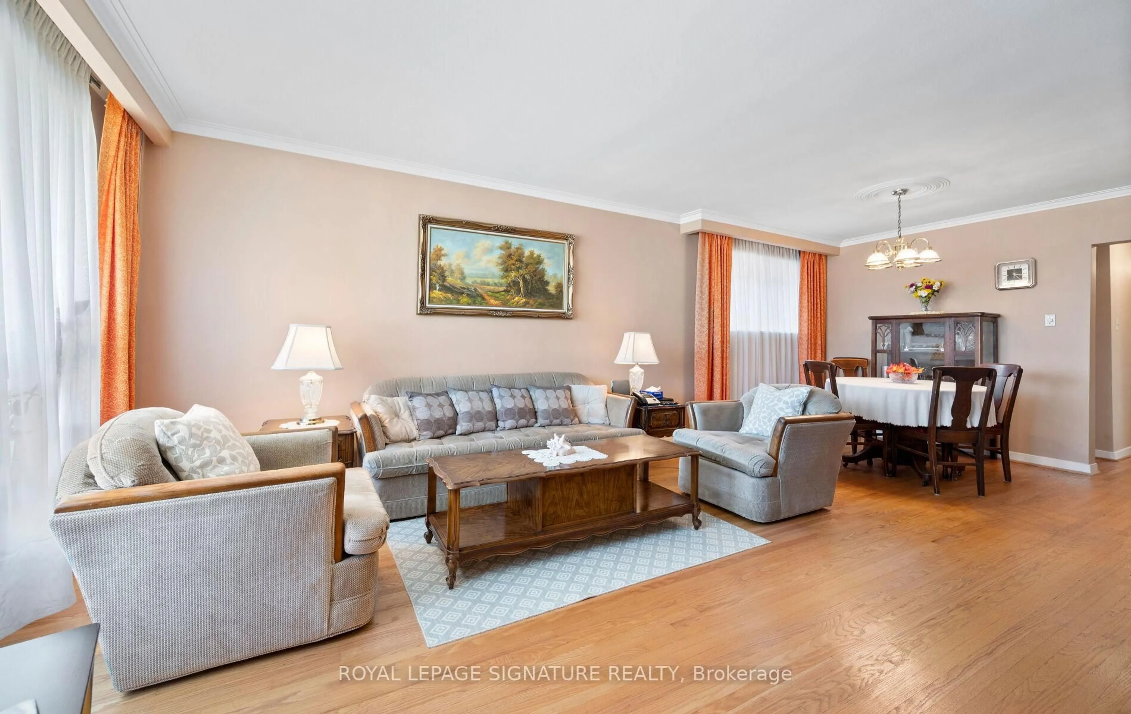 Living room with furniture, wood/laminate floor for 1225 McBride Ave, Mississauga Ontario L5C 1N1