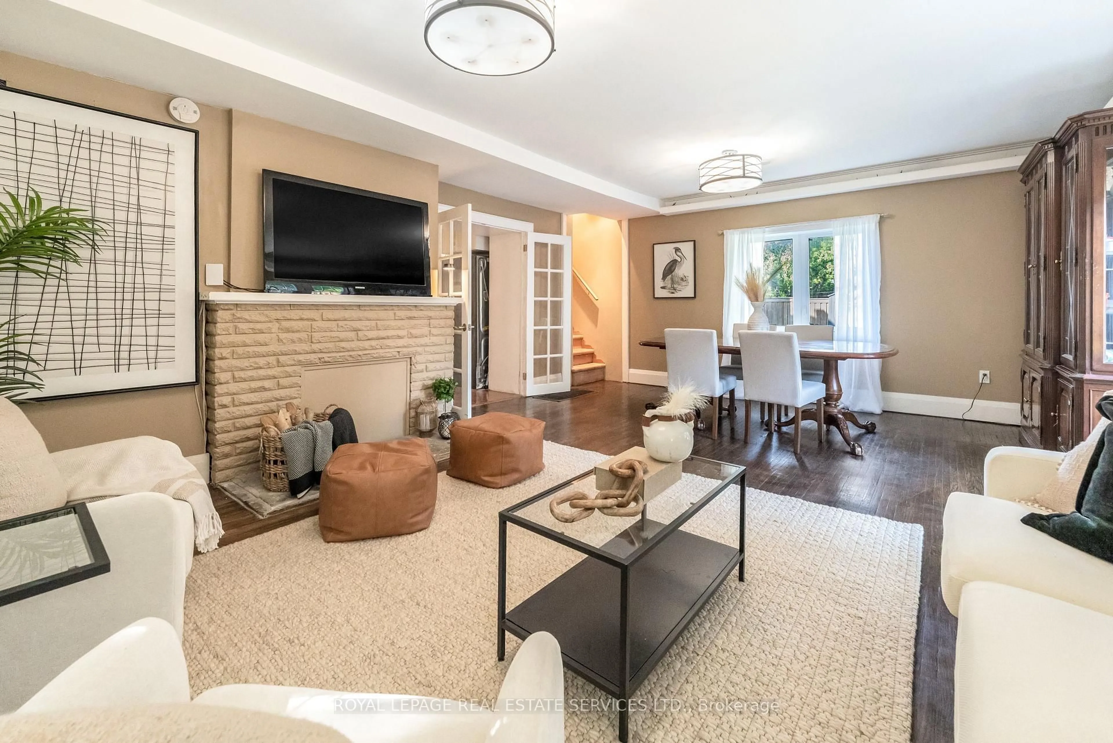 Living room with furniture, ceramic/tile floor for 150 Stanley Ave, Toronto Ontario M8V 1N9