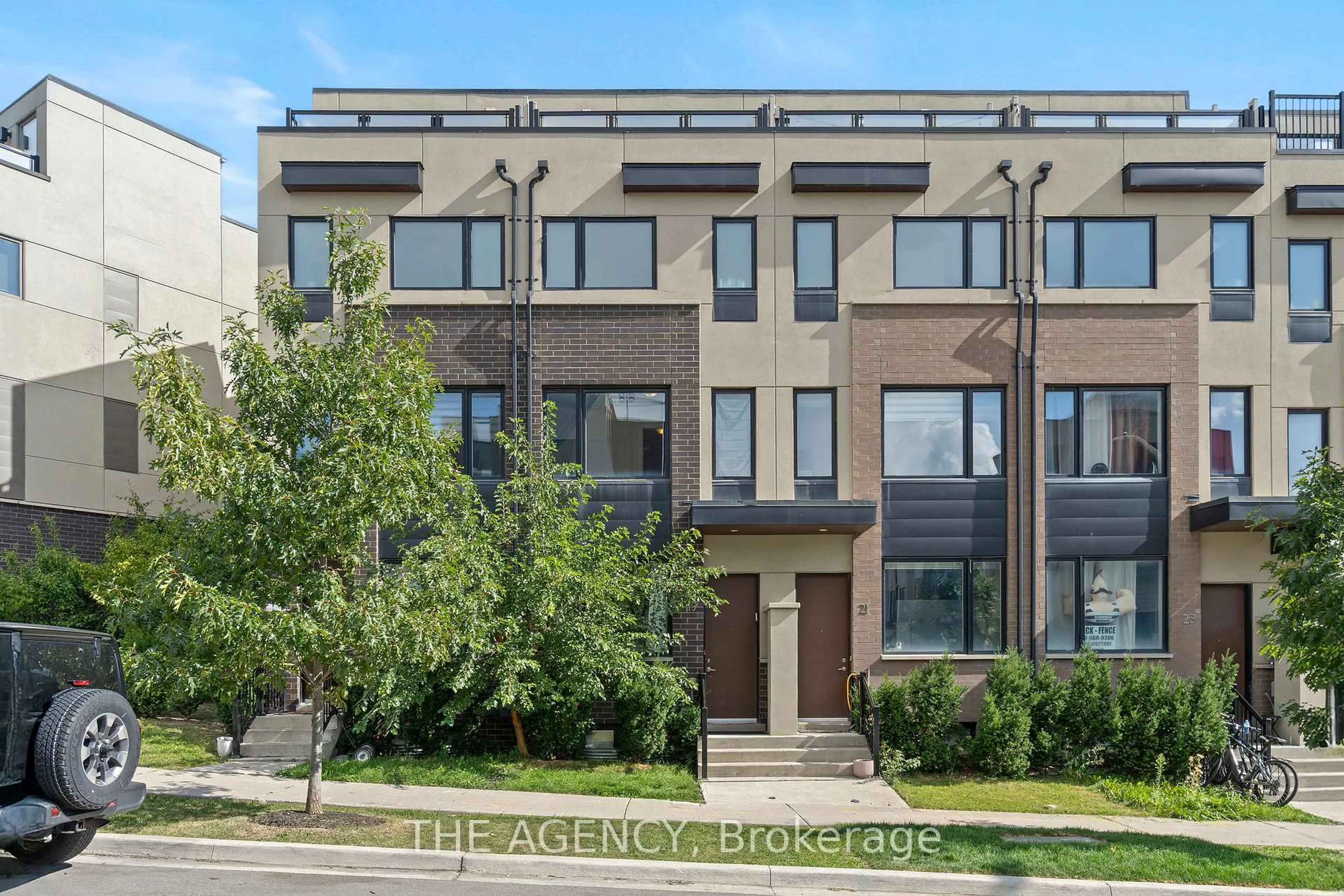 Home with brick exterior material, street for 19 Thomas Mulholland Dr, Toronto Ontario M3K 0B5