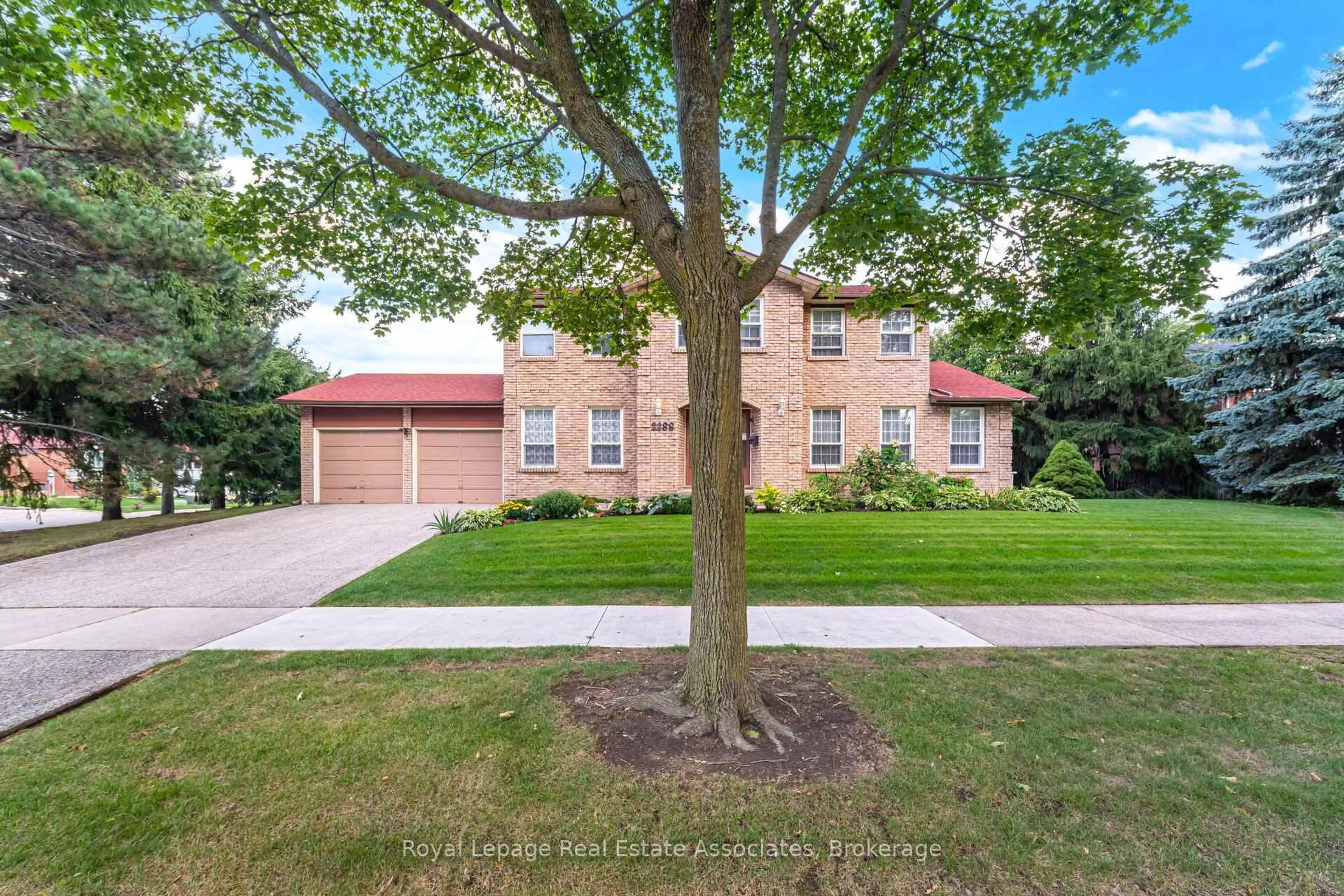 Home with brick exterior material, street for 2288 Log Wood Crt, Mississauga Ontario L5C 3C5