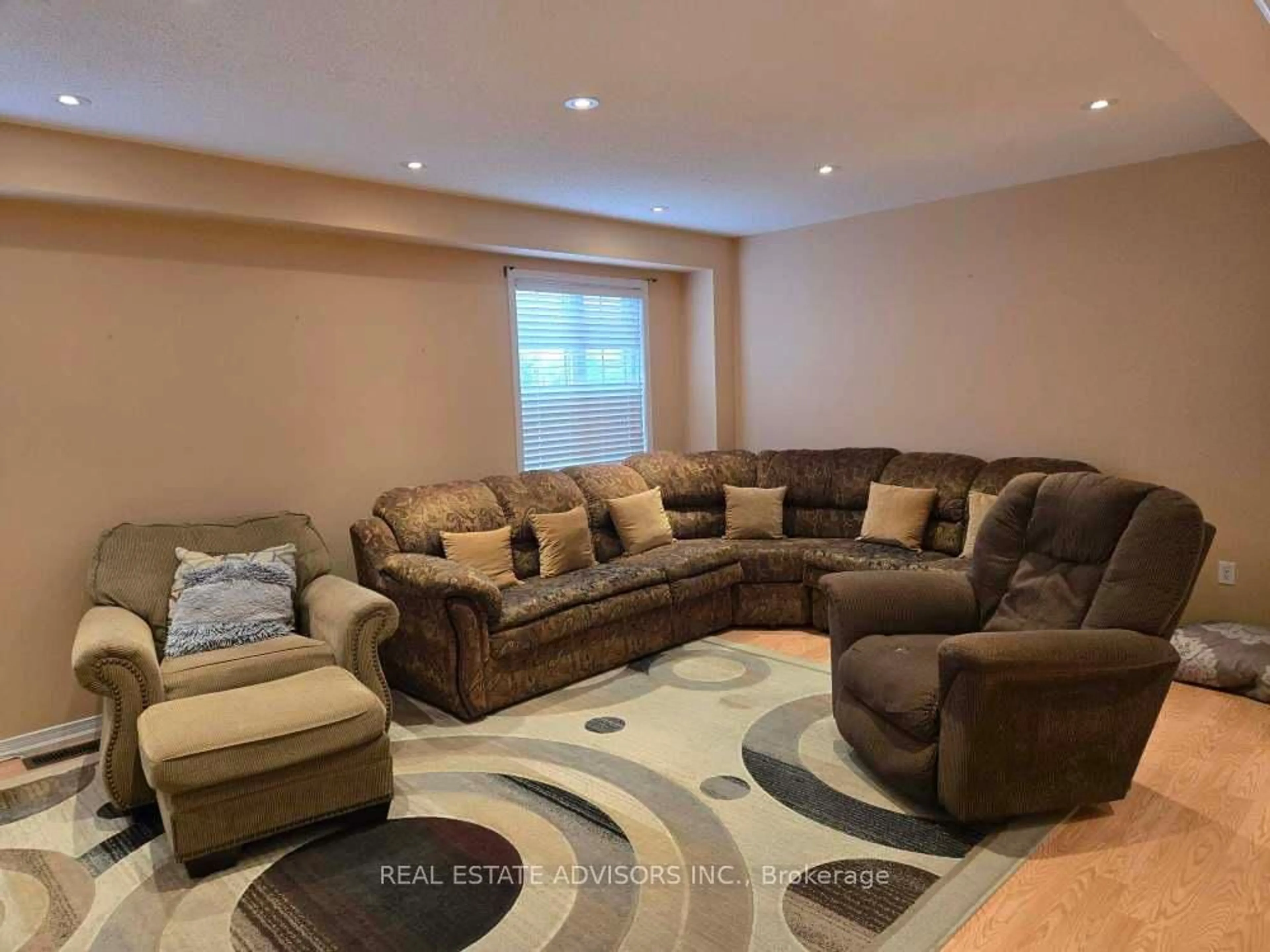 Living room with furniture, unknown for 68 Delport Clse, Brampton Ontario L6P 1V2