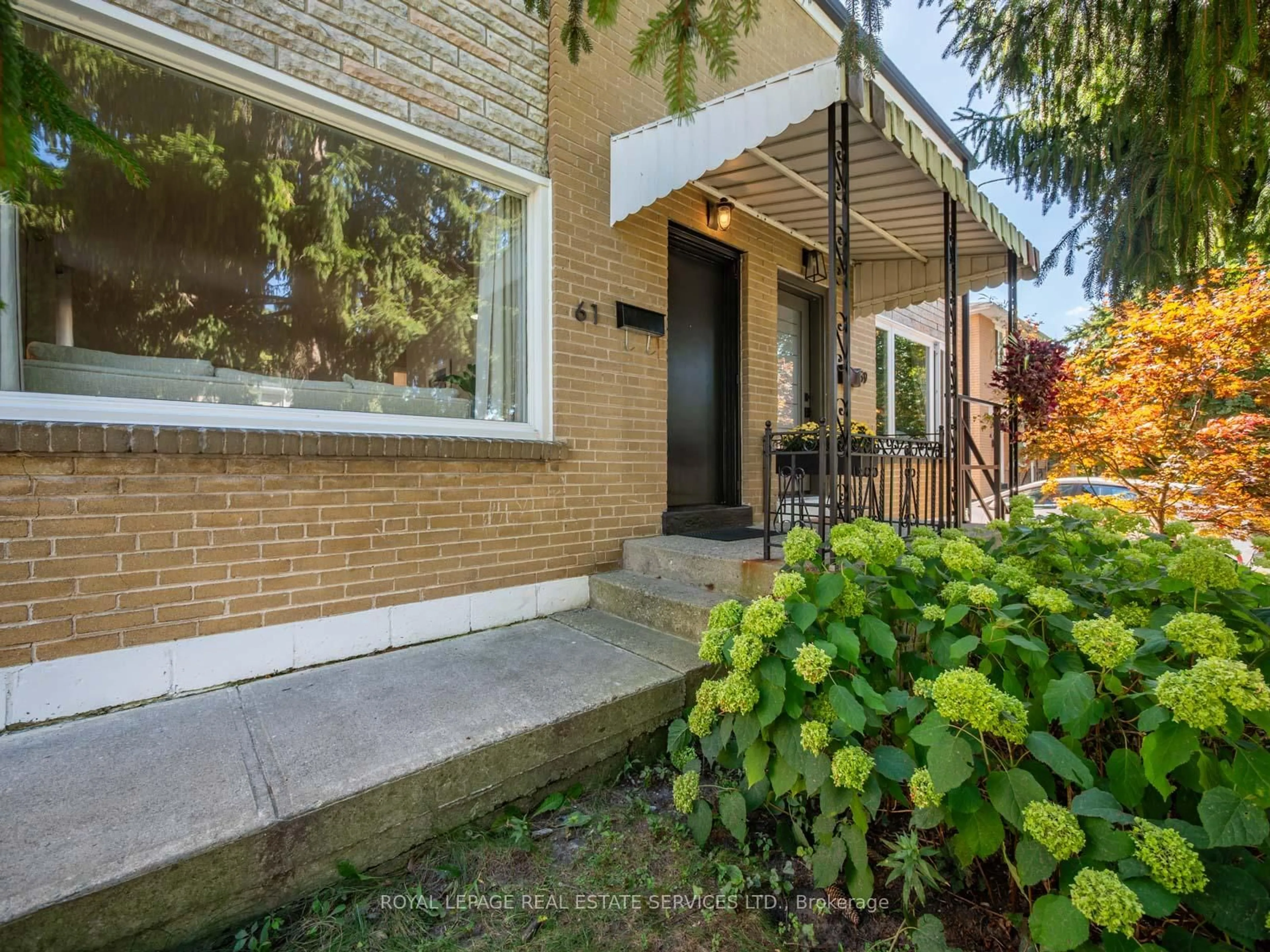 Home with brick exterior material, street for 61 Skylark Rd, Toronto Ontario M6S 4M5