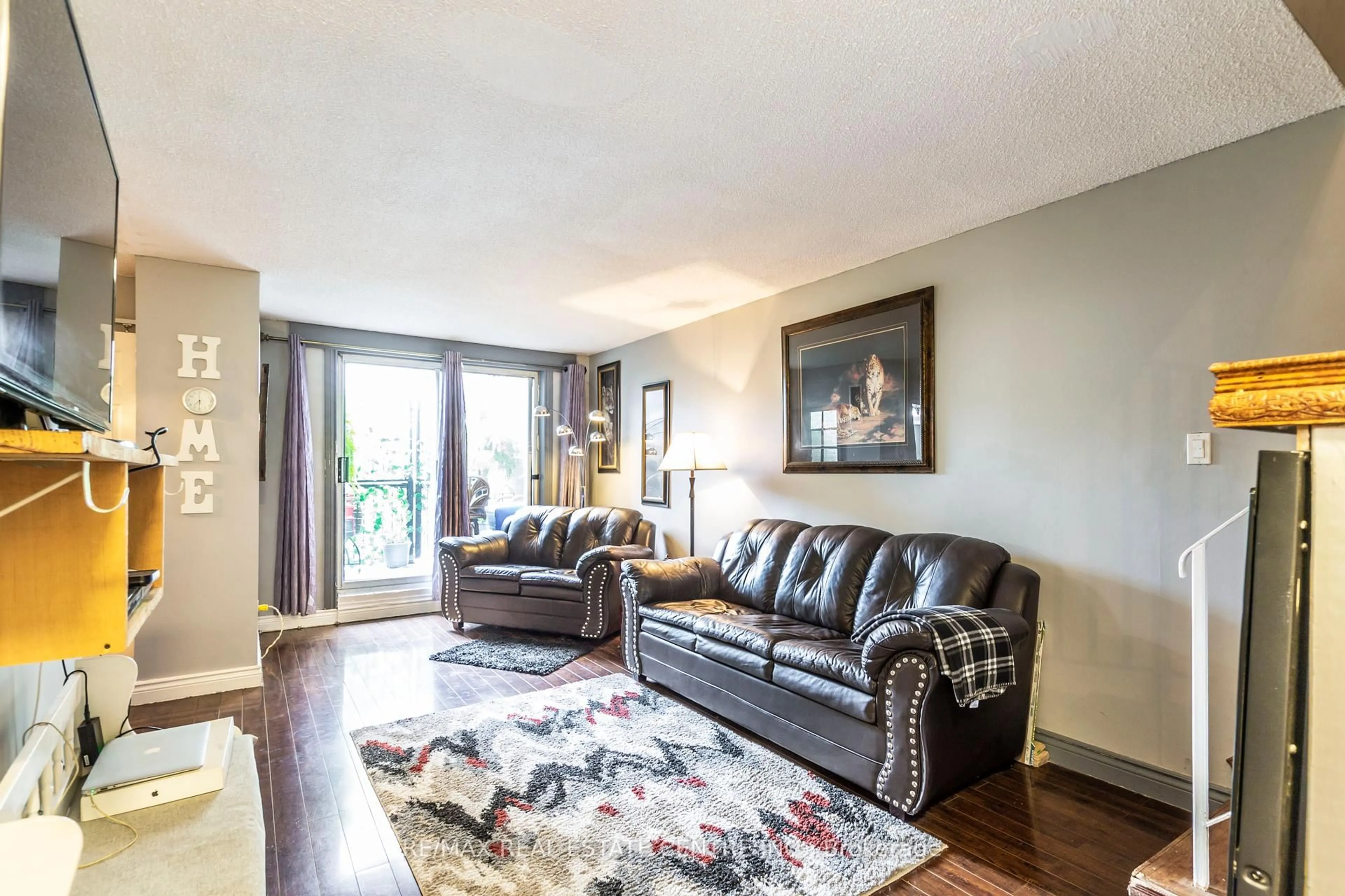 Living room with furniture, unknown for 2095 Roche Crt #124, Mississauga Ontario L5K 2C8