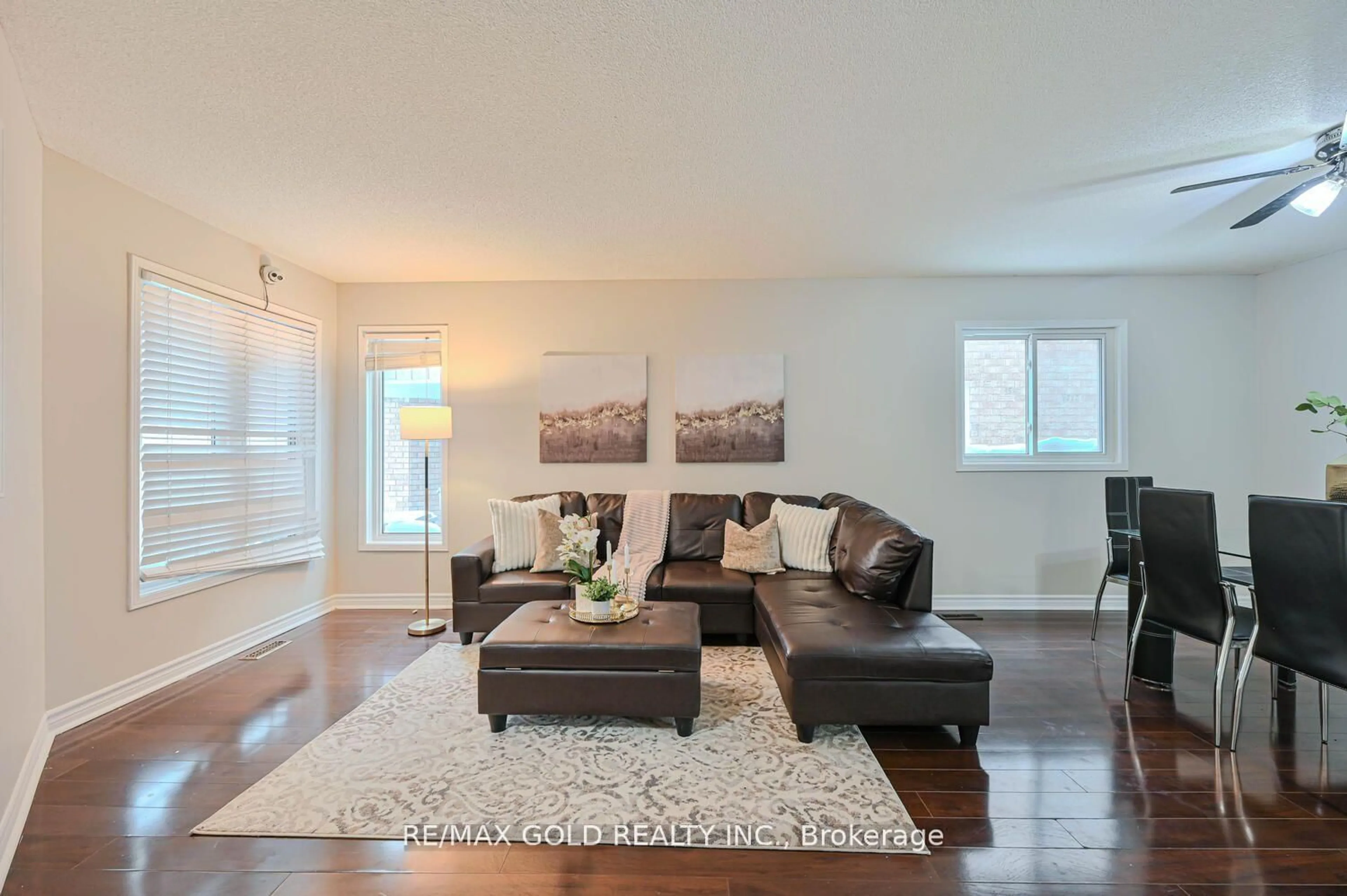 Living room with furniture, unknown for 27 Buttercup Lane, Brampton Ontario L6R 1M9