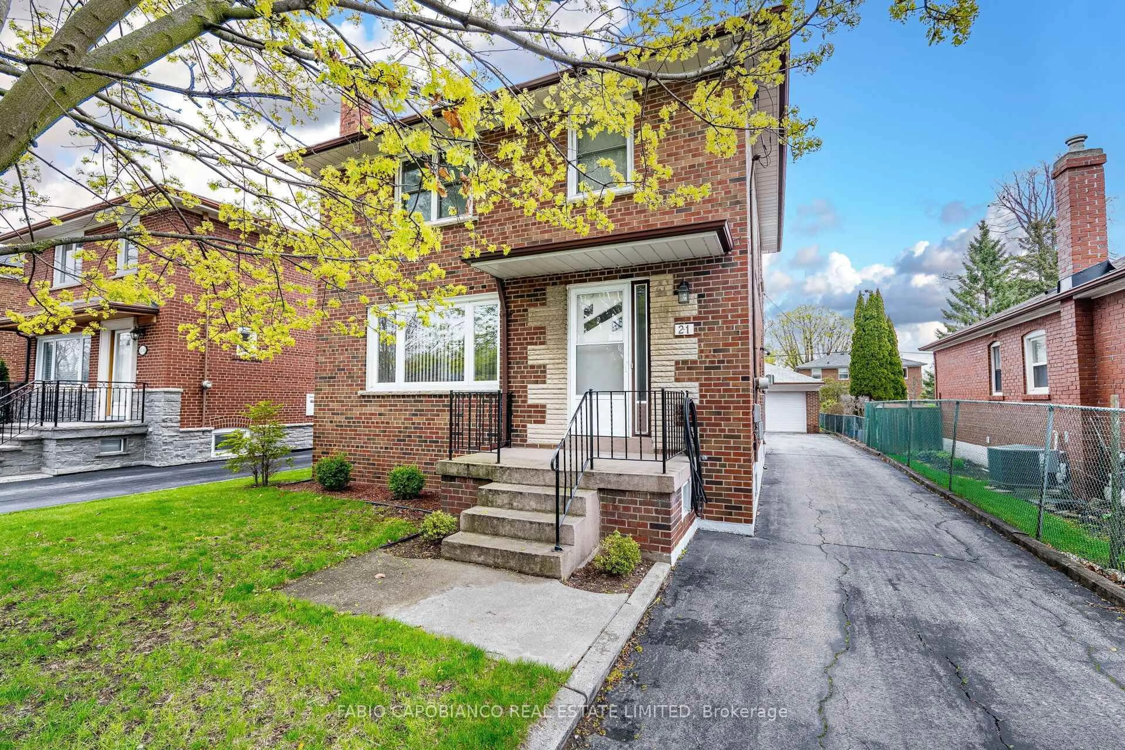 Home with brick exterior material, street for 21 Treeview Dr, Toronto Ontario M8W 4B8