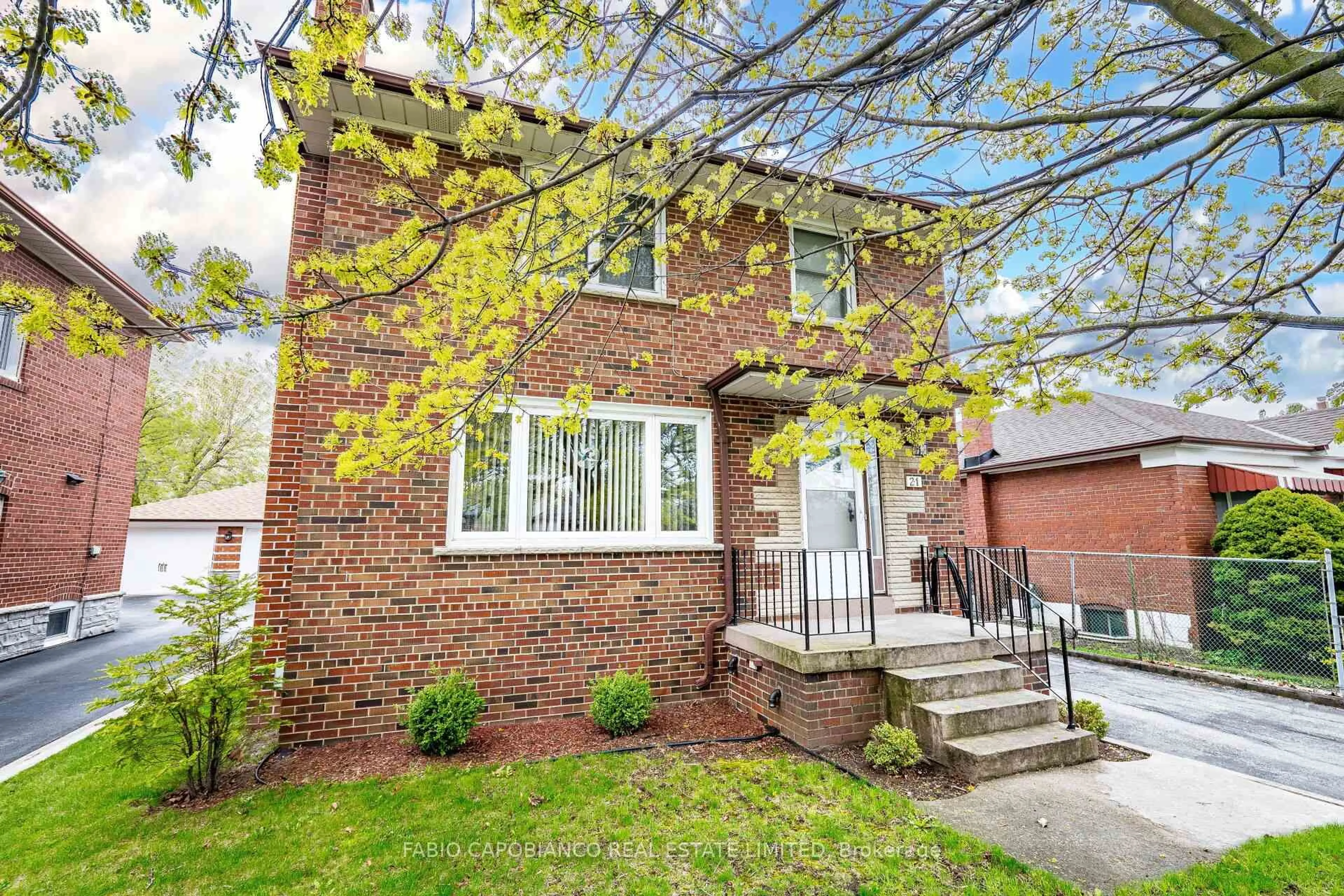 Home with brick exterior material, street for 21 Treeview Dr, Toronto Ontario M8W 4B8