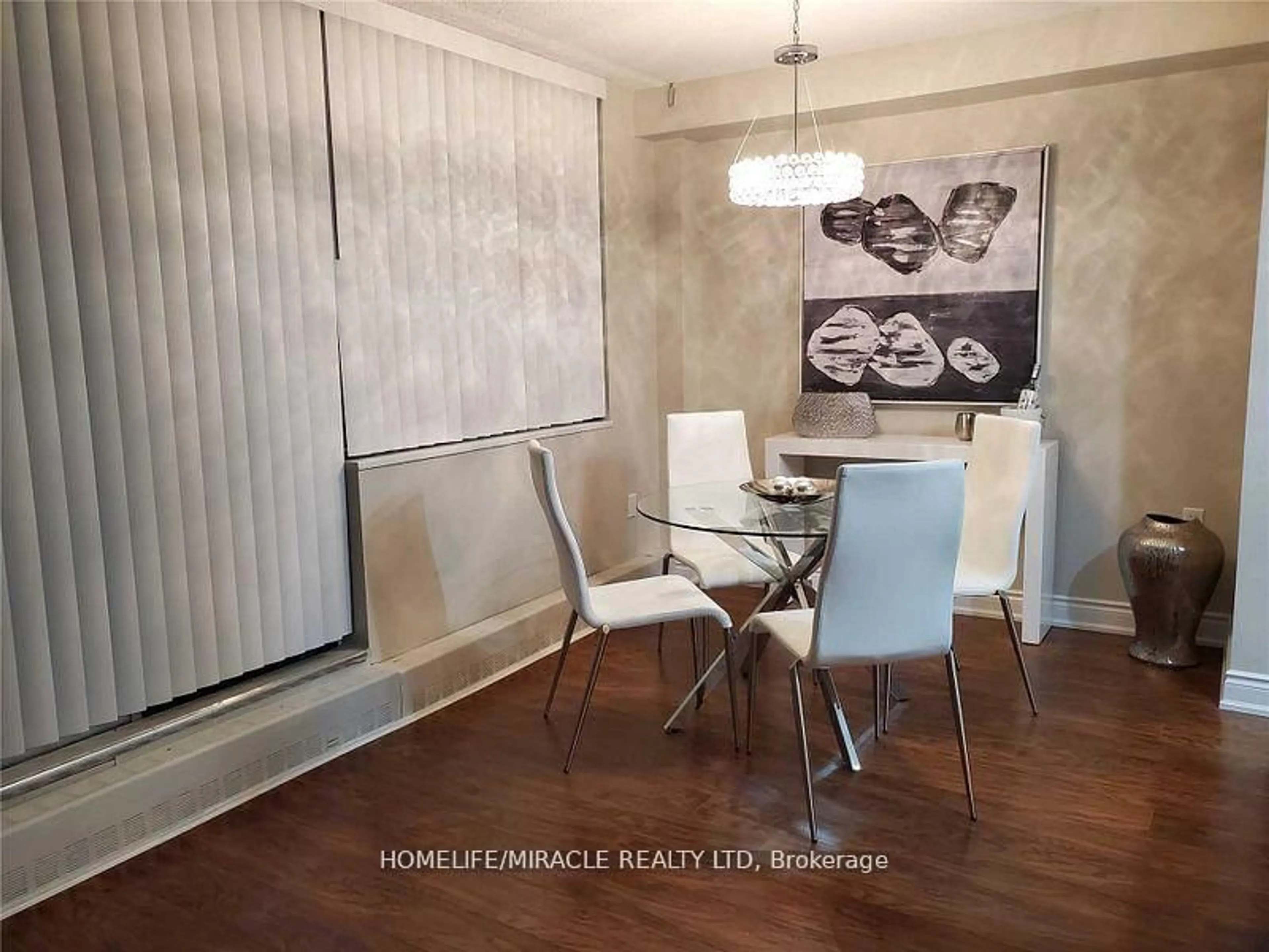 Dining room, wood/laminate floor for 1050 Stainton Dr #134, Mississauga Ontario L5C 2T7