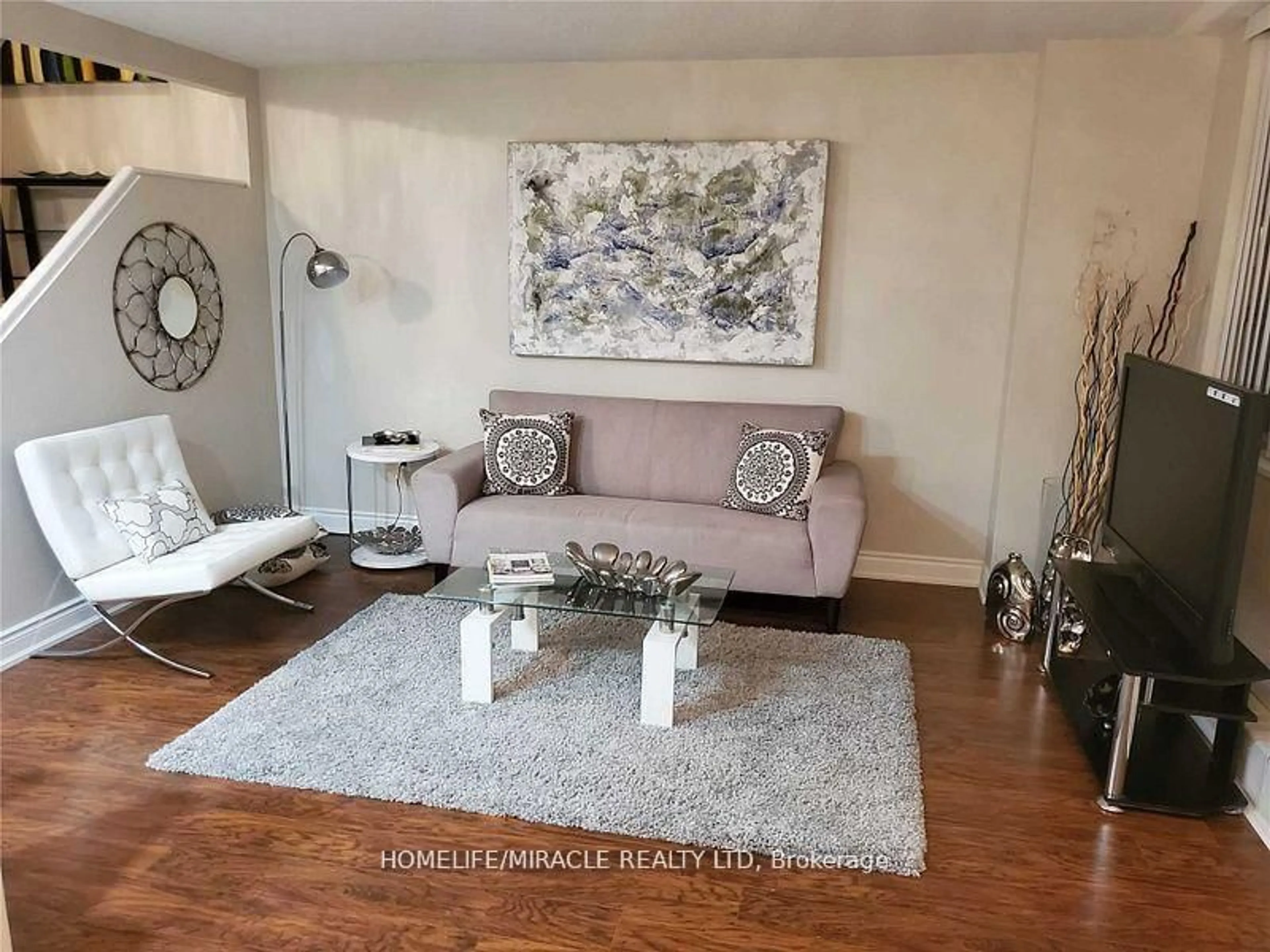 Living room with furniture, unknown for 1050 Stainton Dr #134, Mississauga Ontario L5C 2T7