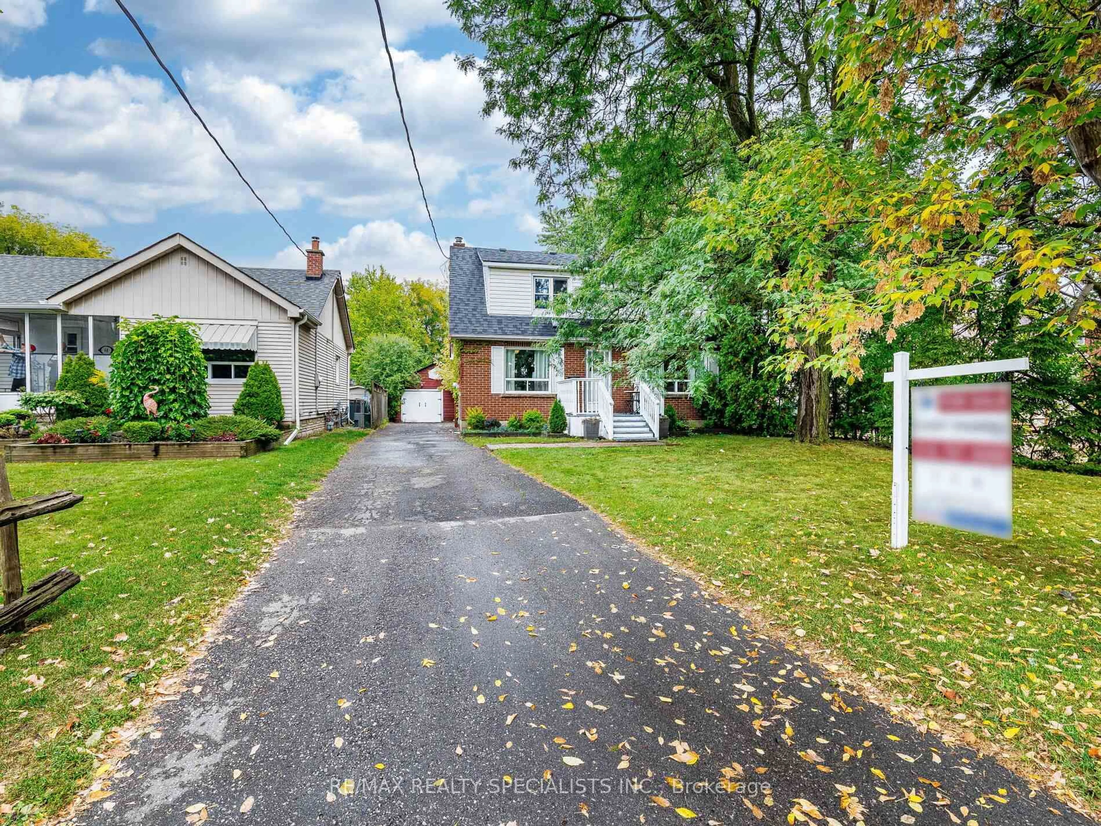 A pic from outside/outdoor area/front of a property/back of a property/a pic from drone, street for 66 McMurchy Ave, Brampton Ontario L6X 1Y2