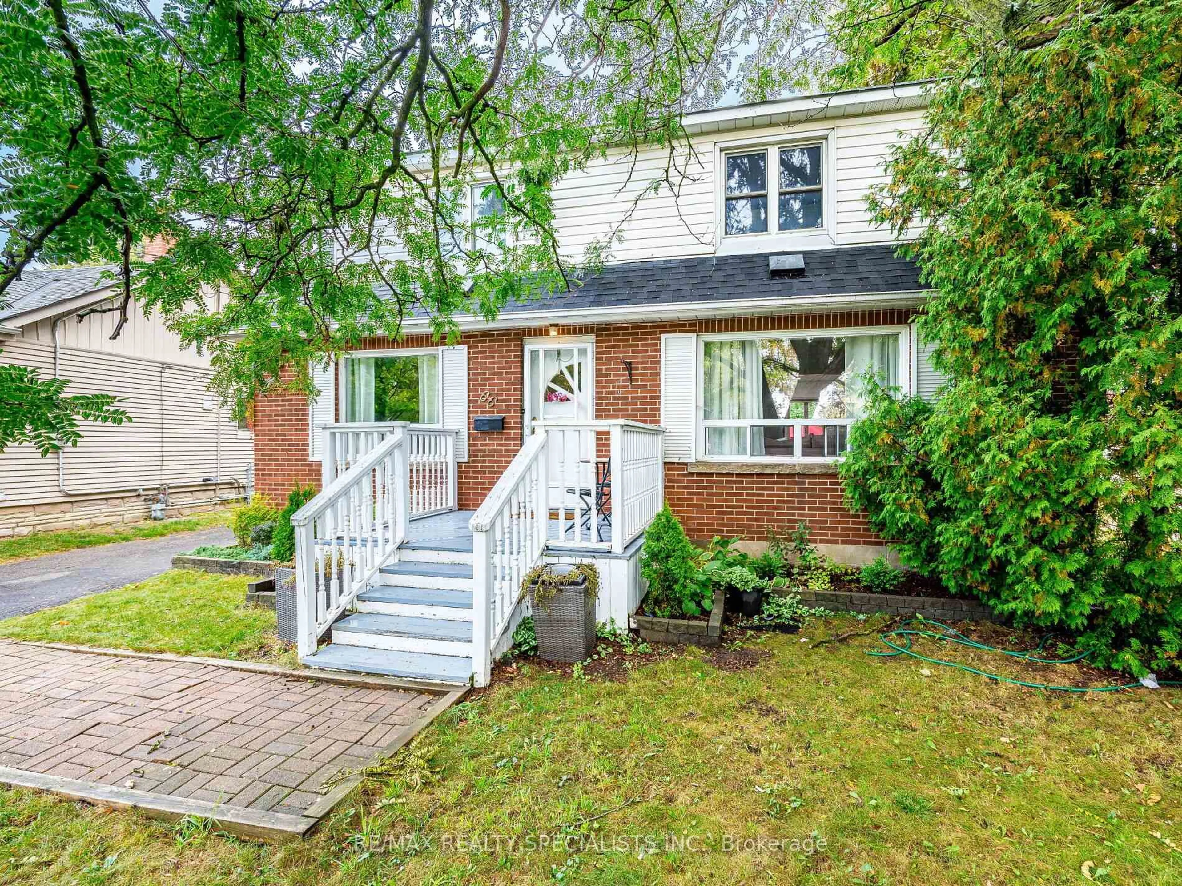 Home with brick exterior material, street for 66 McMurchy Ave, Brampton Ontario L6X 1Y2