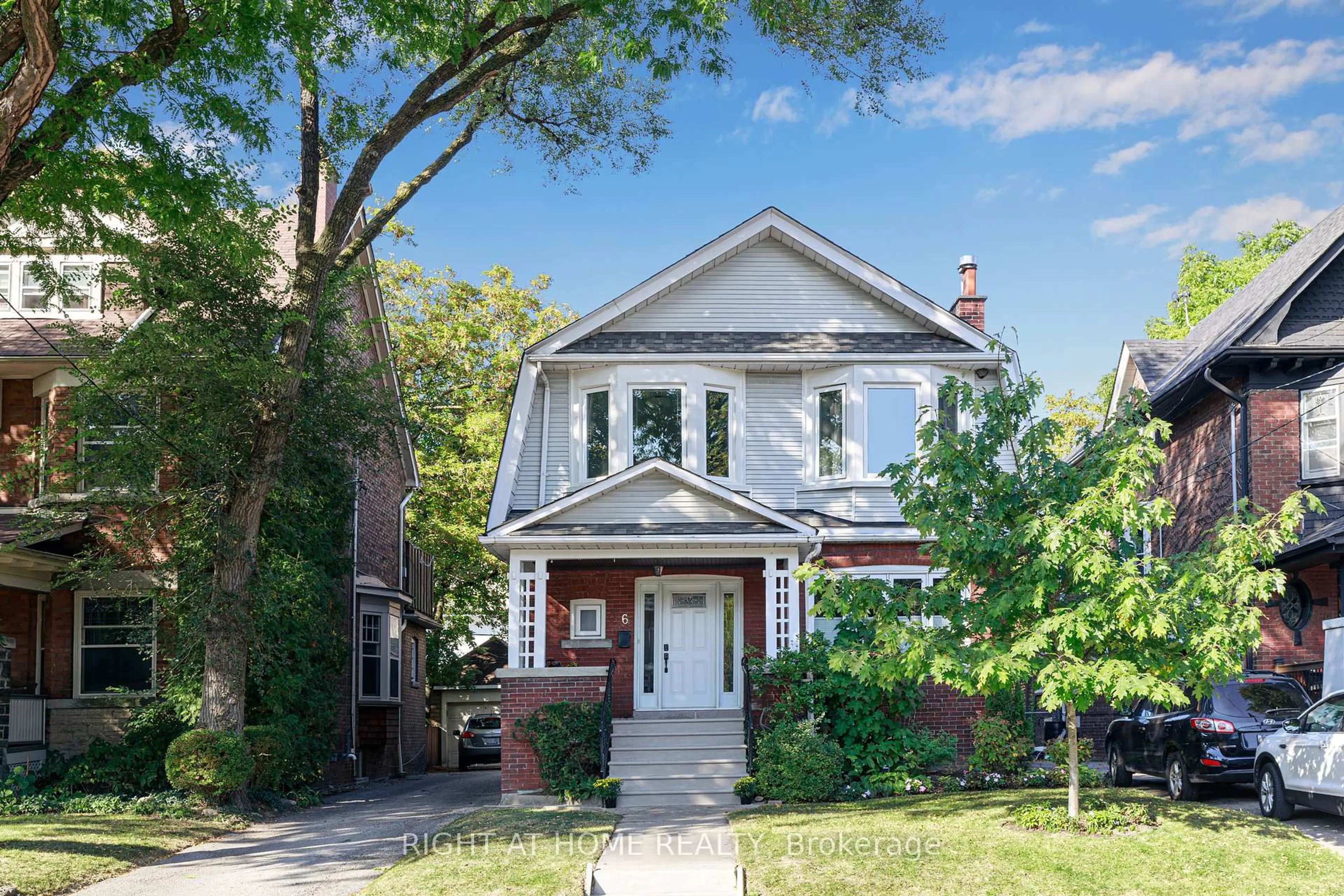 Home with brick exterior material, street for 6 Lauder Ave, Toronto Ontario M6H 3E3