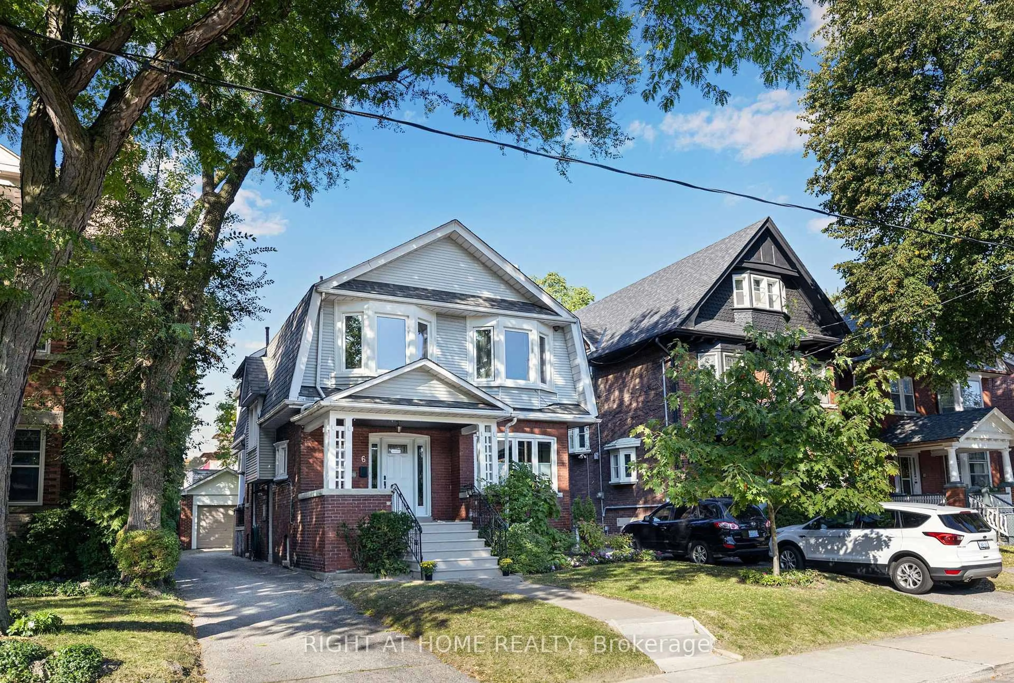 Home with brick exterior material, street for 6 Lauder Ave, Toronto Ontario M6H 3E3