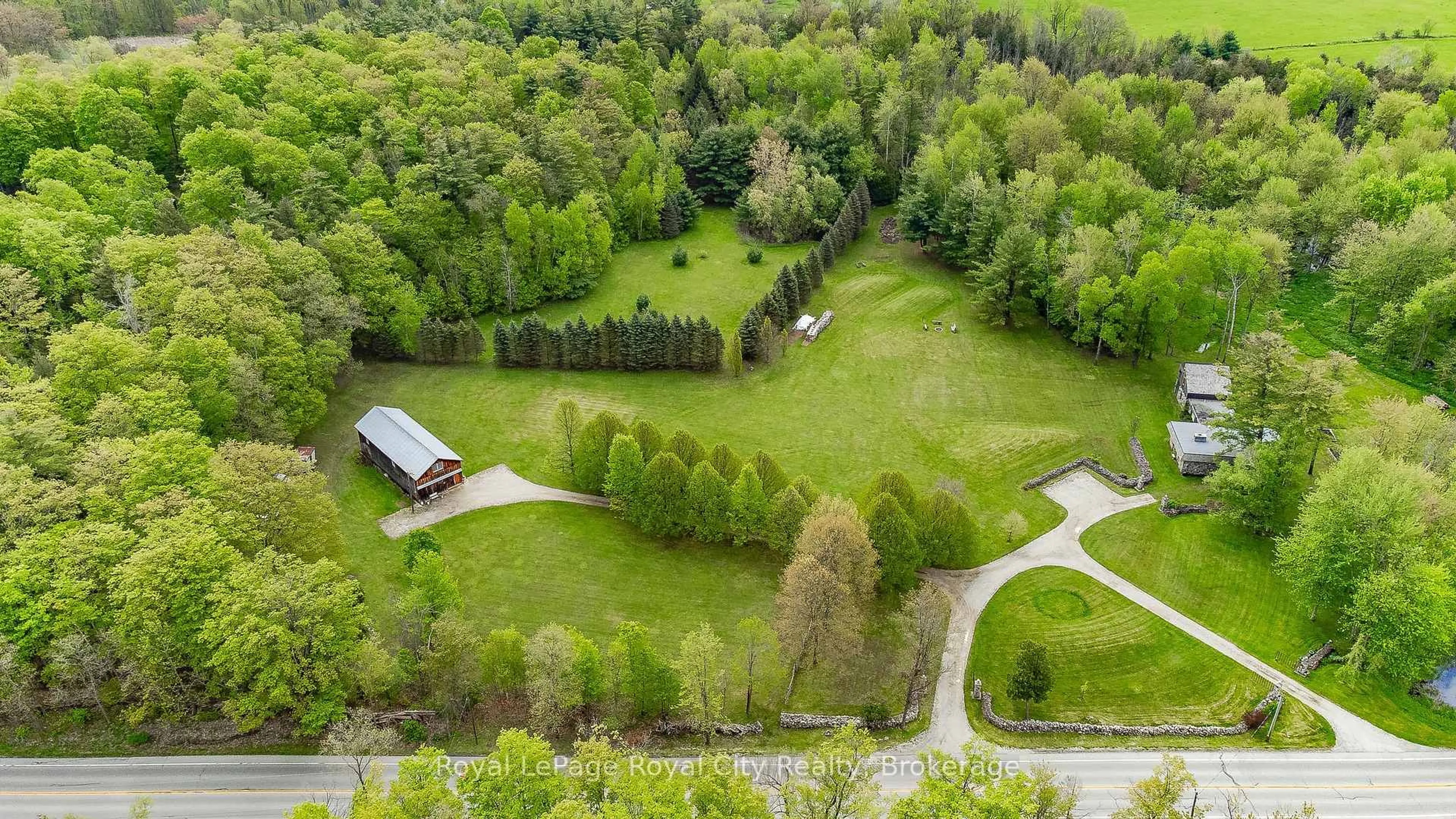 A pic from outside/outdoor area/front of a property/back of a property/a pic from drone, forest/trees view for 1159 Campbellville Rd, Milton Ontario L0P 1B0