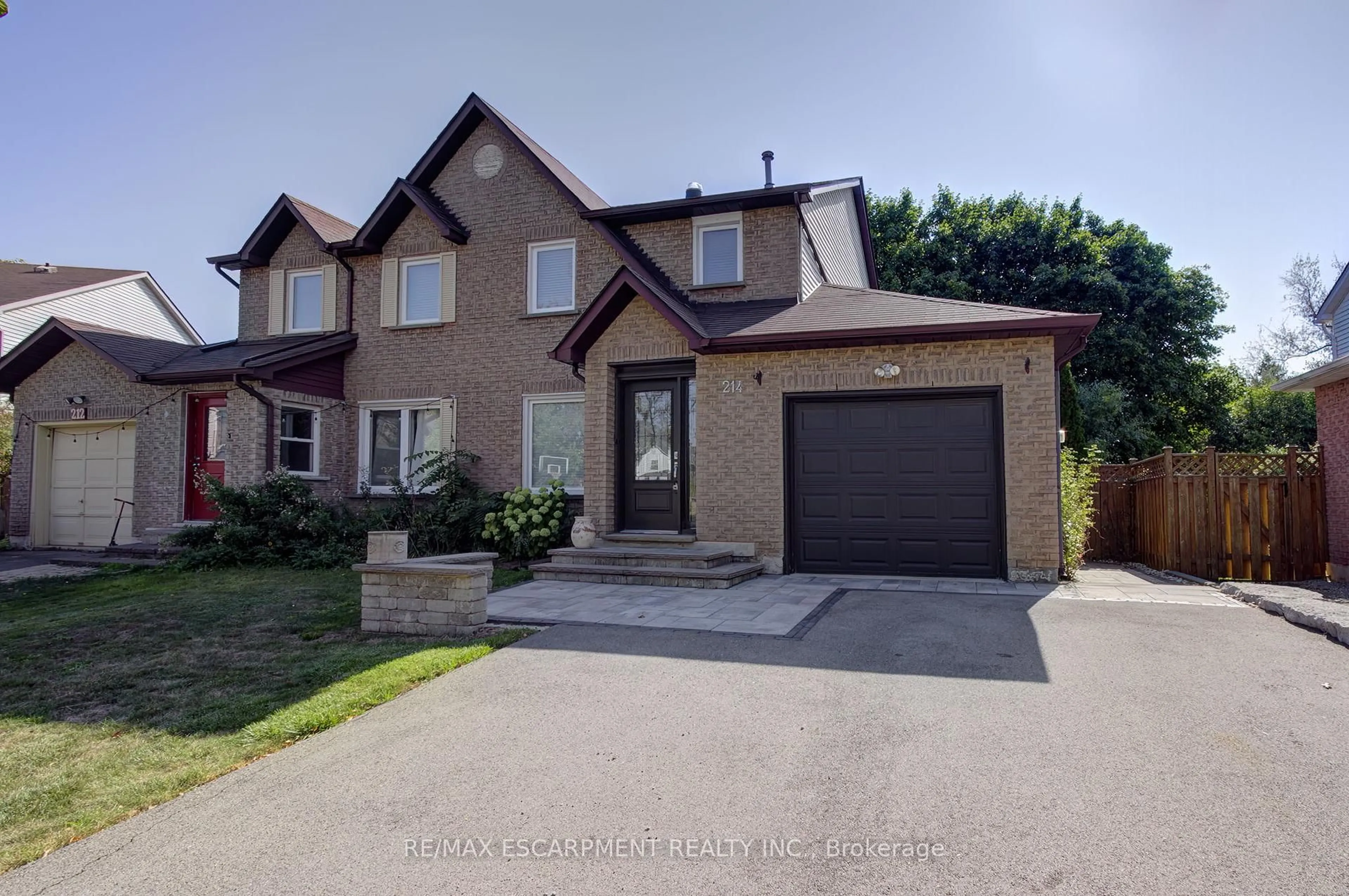 Home with brick exterior material, street for 214 Ross Lane, Oakville Ontario L6H 5K5