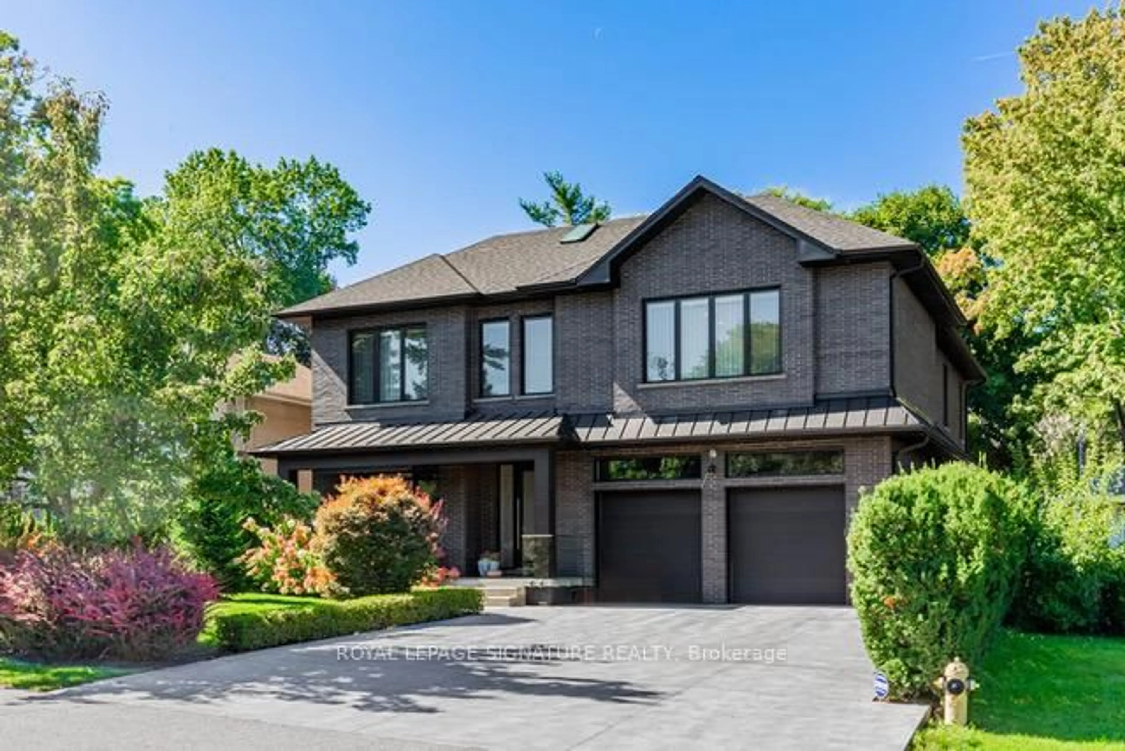 Home with brick exterior material, street for 20 Hartfield Crt, Toronto Ontario M9A 3E4