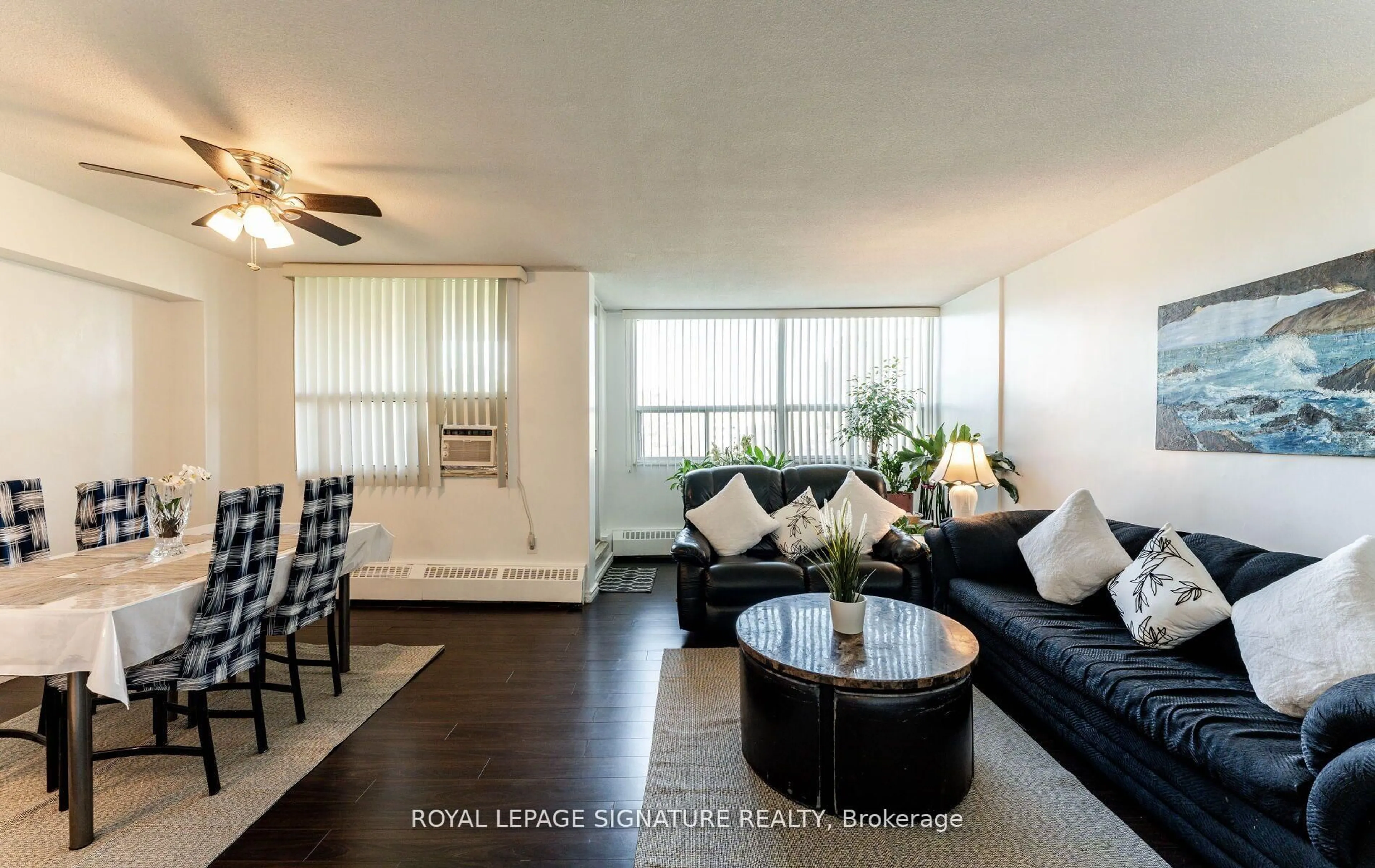 Living room with furniture, wood/laminate floor for 551 The West Mall #620, Toronto Ontario M9C 1G7