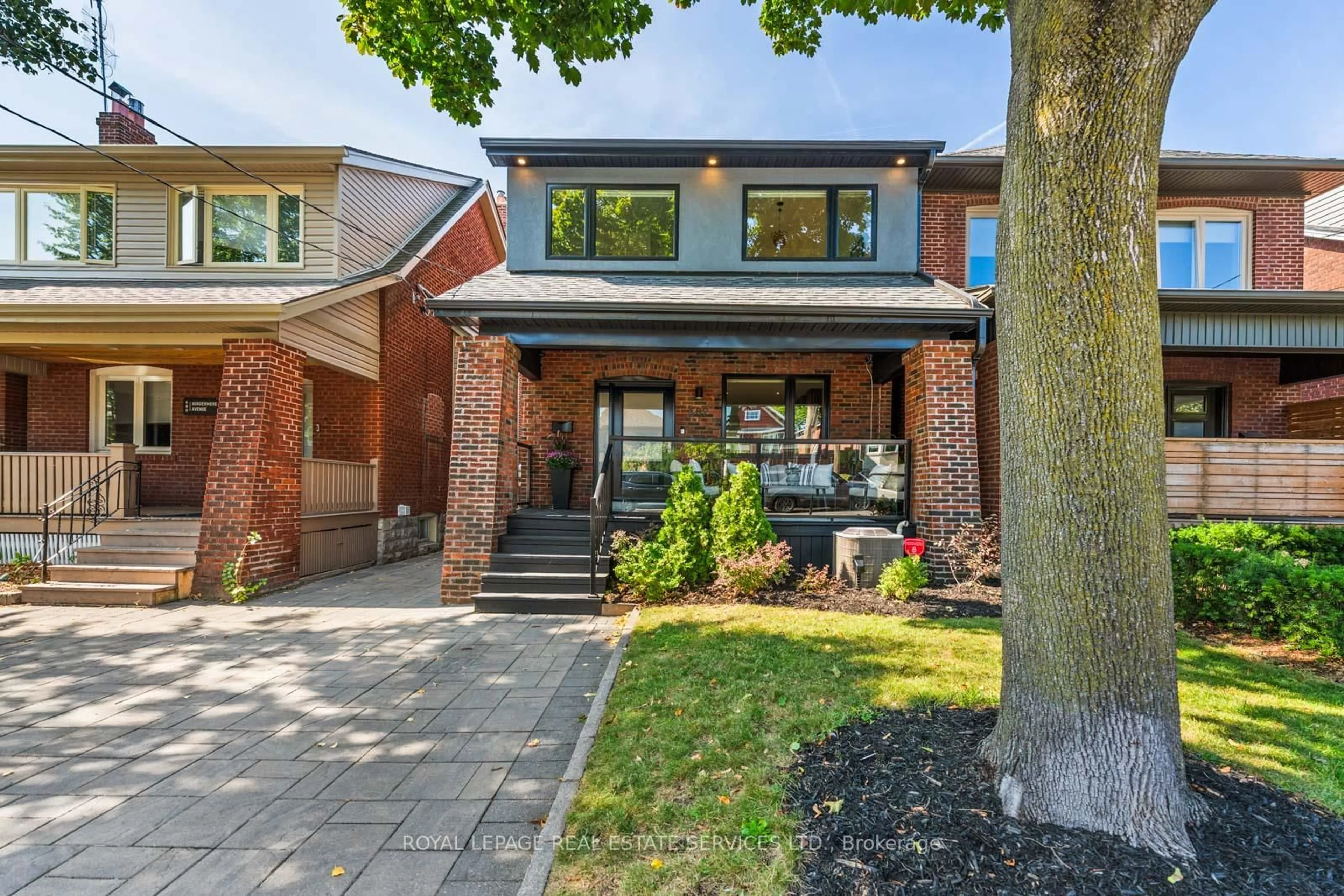Home with brick exterior material, street for 682 Windermere Ave, Toronto Ontario M6S 3M1