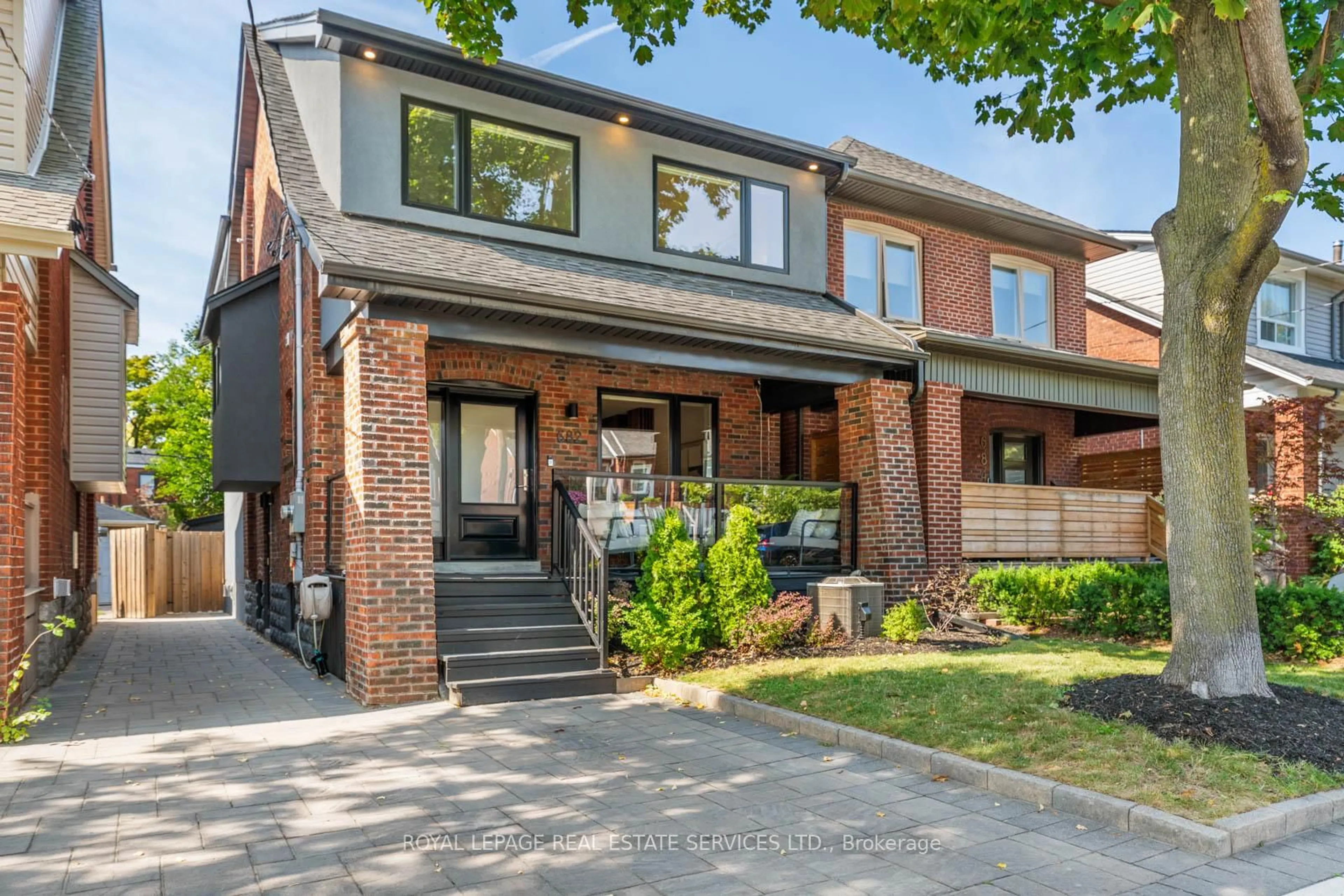 Home with brick exterior material, street for 682 Windermere Ave, Toronto Ontario M6S 3M1