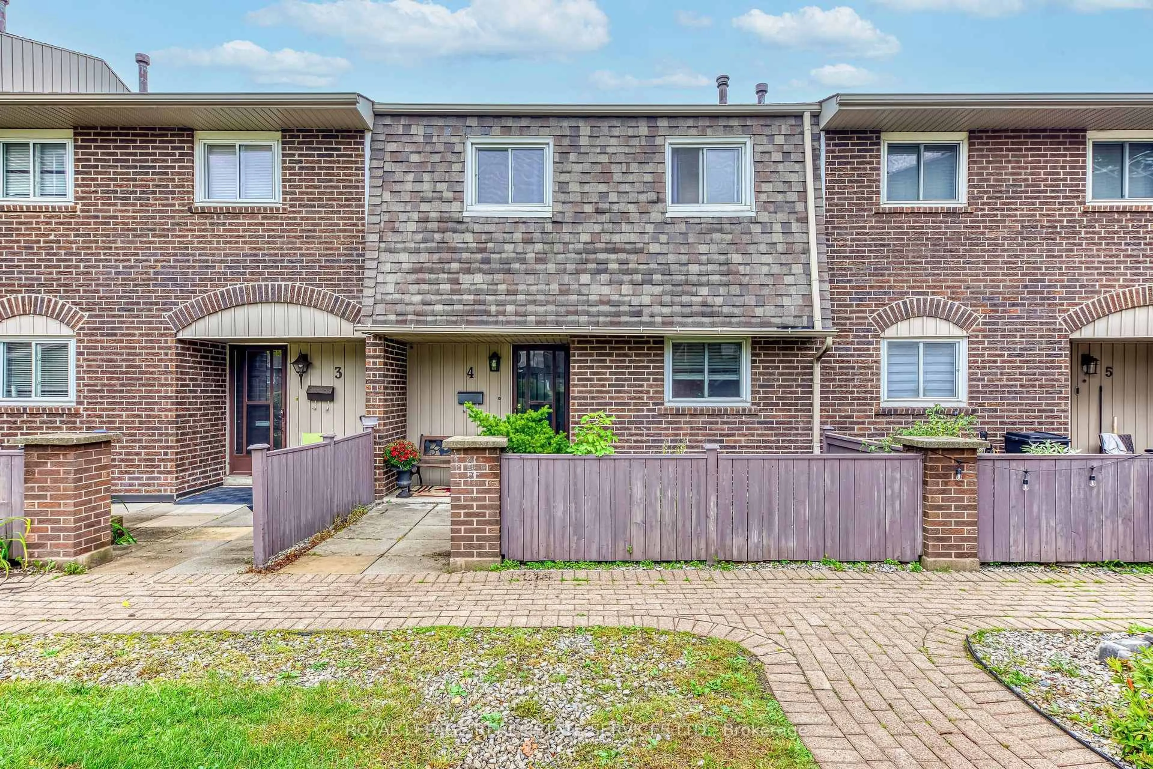 Home with brick exterior material, street for 1294 Guelph Line #4, Burlington Ontario L7P 2S9