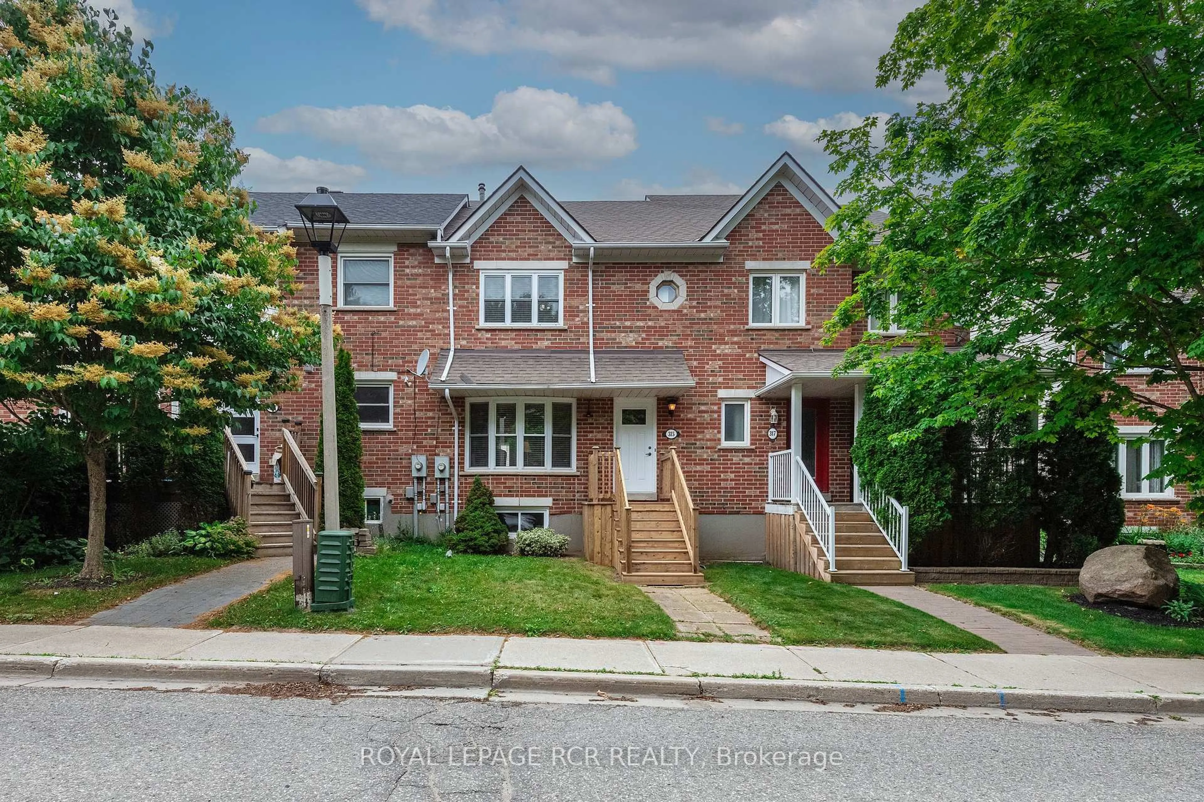 Home with brick exterior material, street for 315 Cottonwood St, Orangeville Ontario L9W 4X7