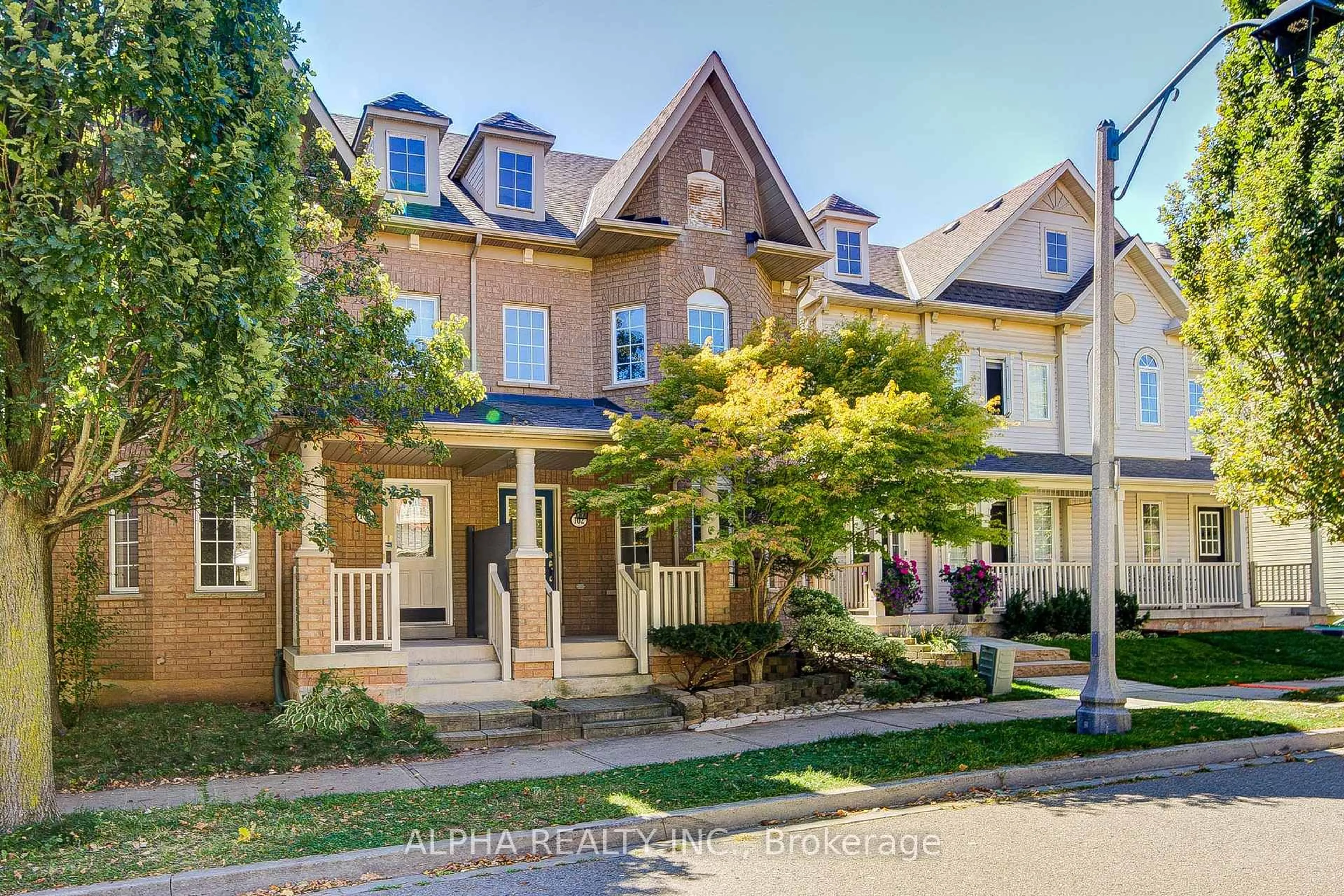 Home with brick exterior material, street for 102 Roxton Rd, Oakville Ontario L6H 6V4