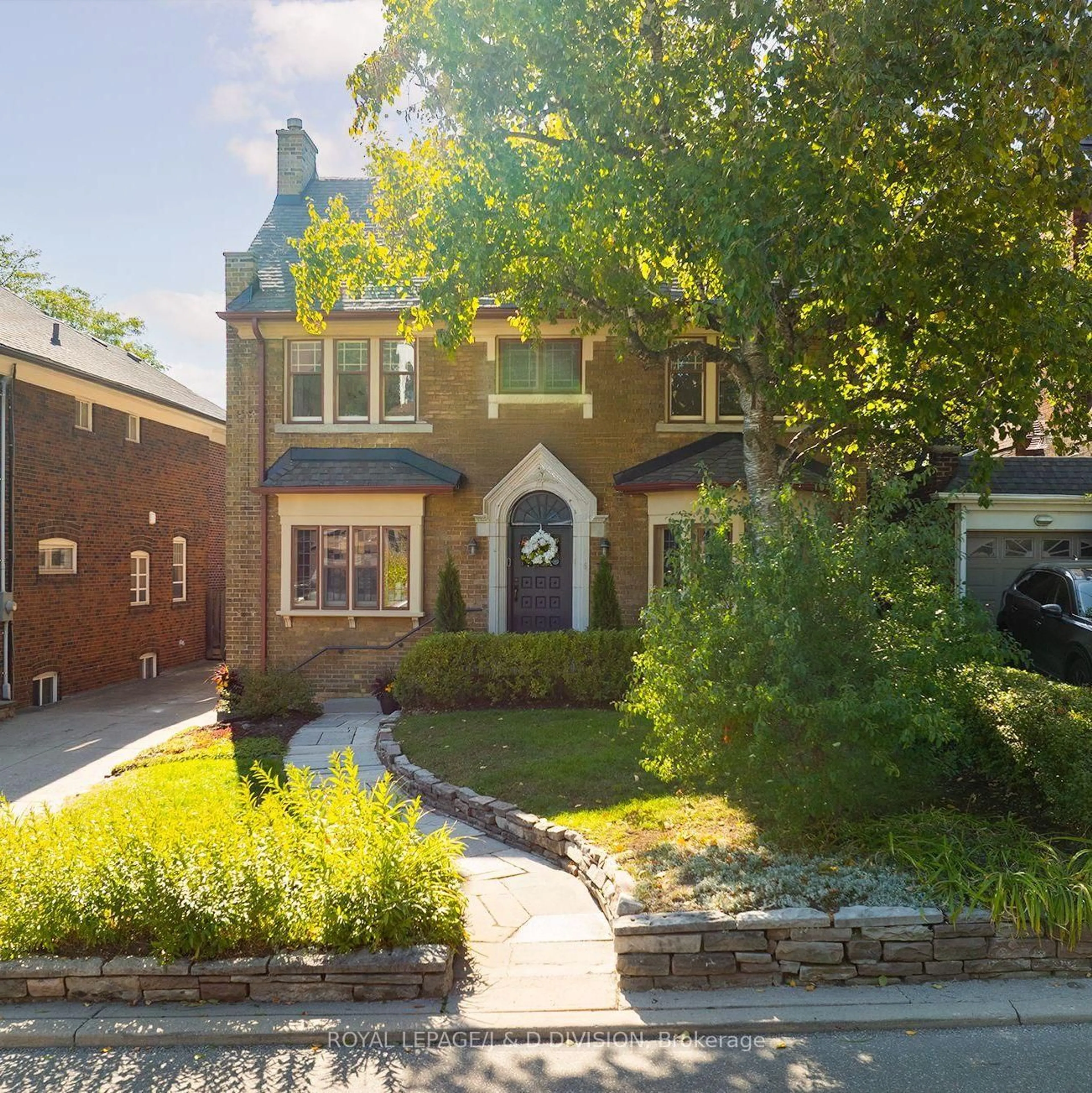 Home with brick exterior material, street for 18 Grenadier Hts, Toronto Ontario M6S 2W6