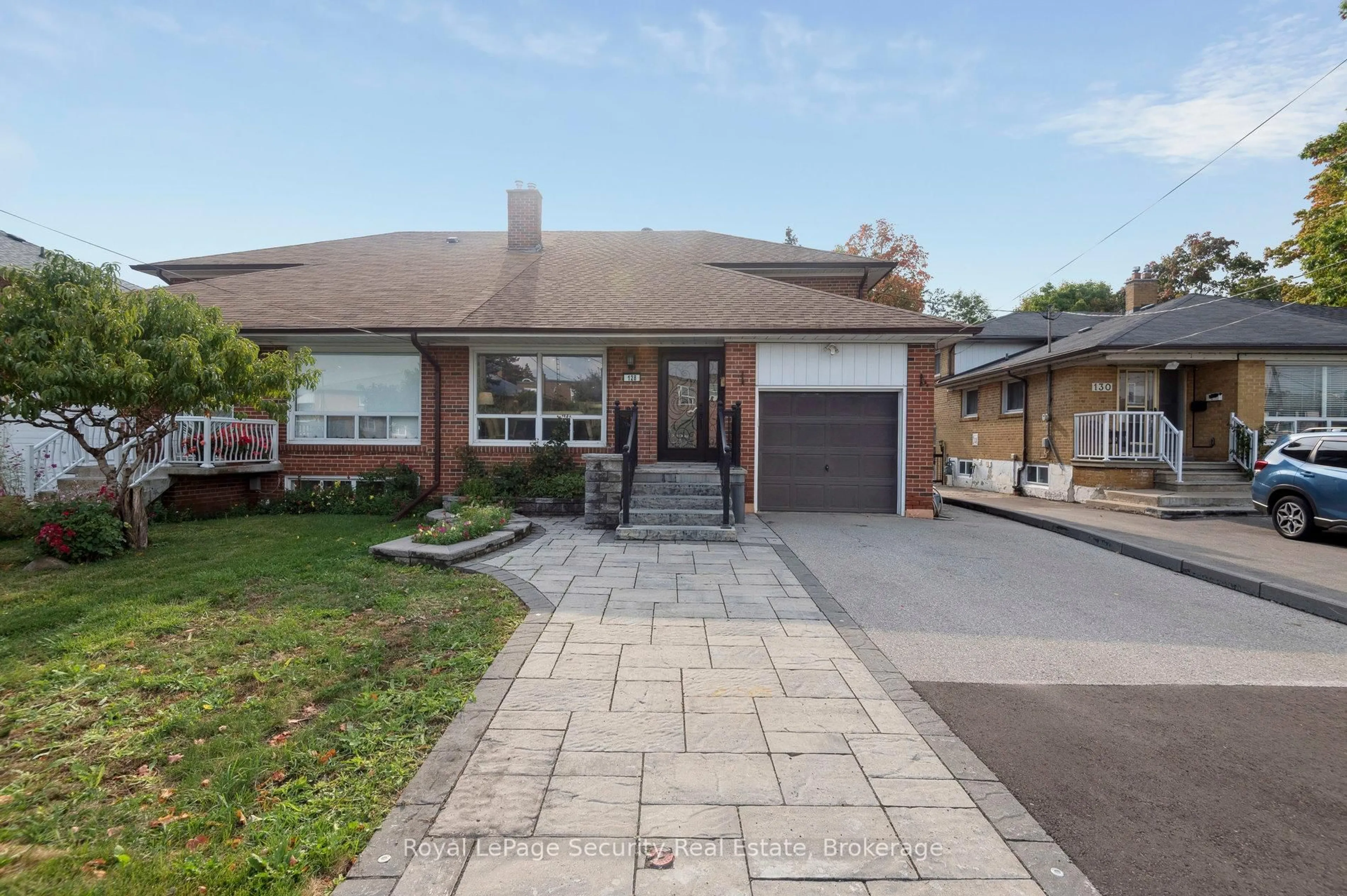 Home with brick exterior material, street for 128 Sentinel Rd, Toronto Ontario M3J 1T2