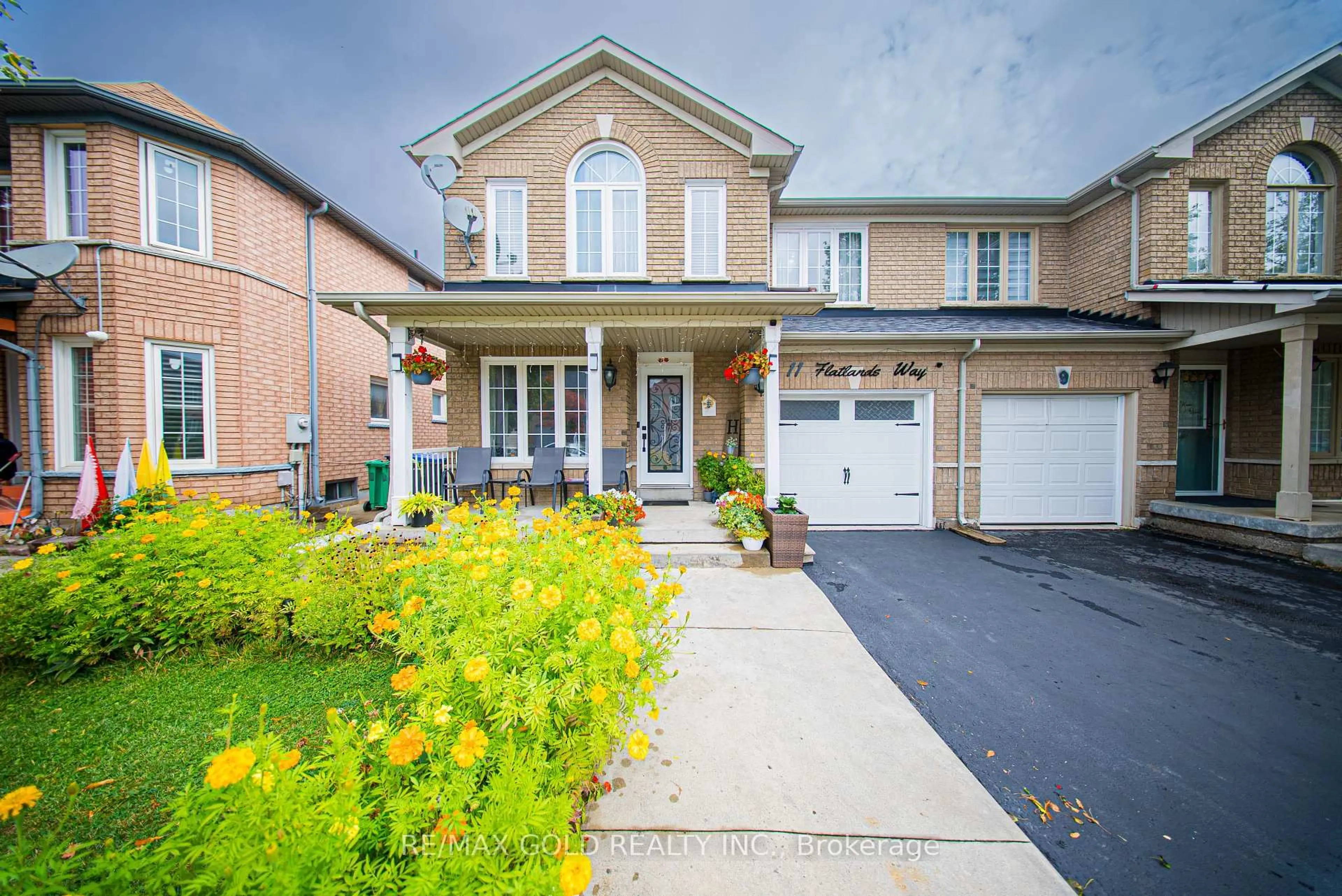 Home with brick exterior material, street for 11 Flatlands Way, Brampton Ontario L6R 2B5