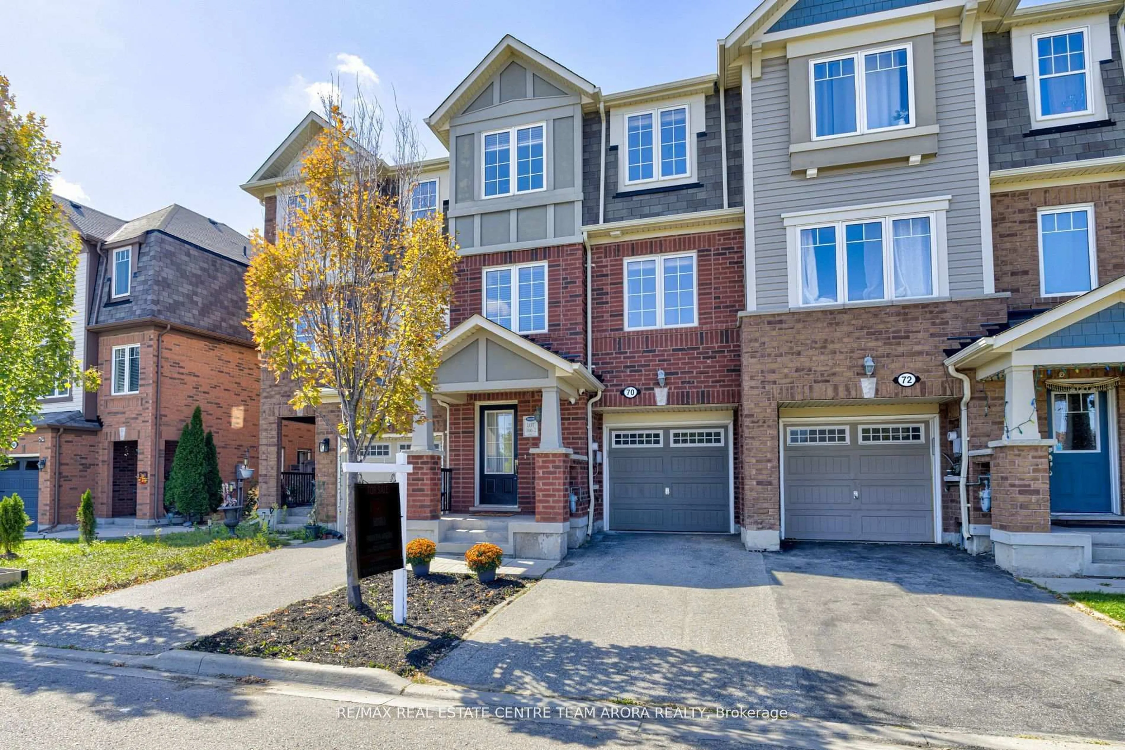 Home with brick exterior material, street for 70 Memory Lane, Brampton Ontario L7A 0W5