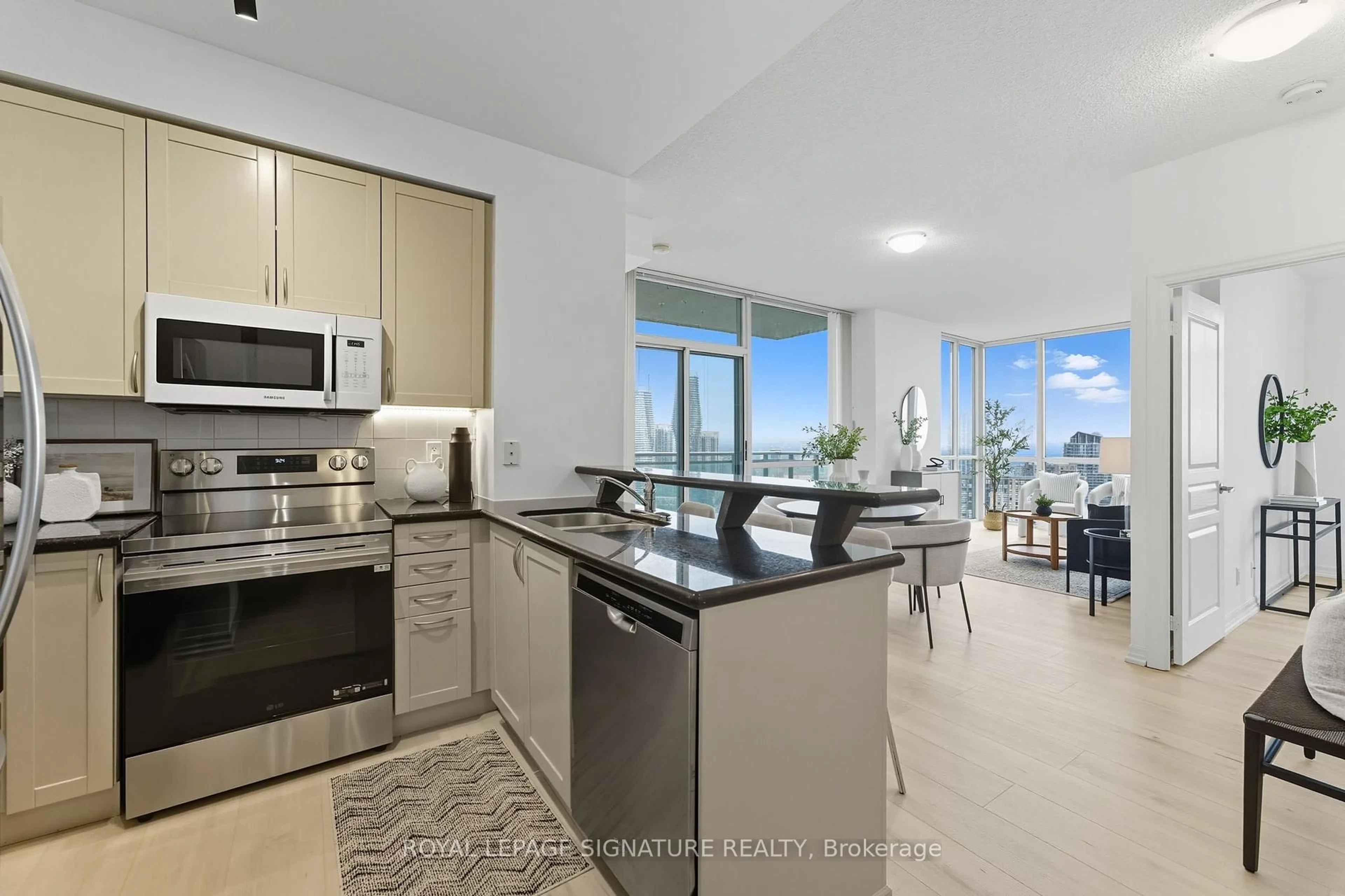 Open concept kitchen, unknown for 220 Burnhamthorpe Rd #2702, Mississauga Ontario L5B 4N4