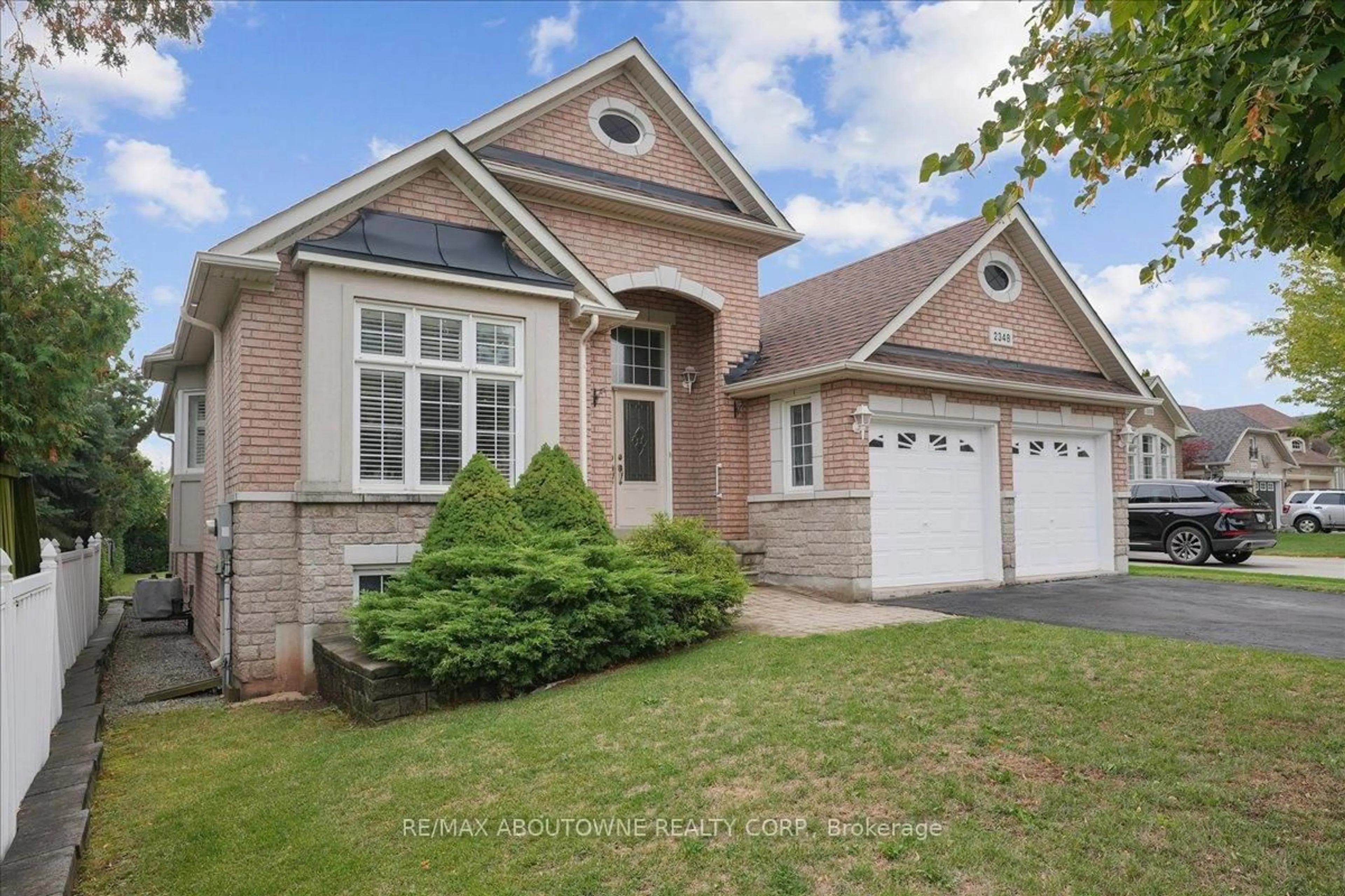 Home with brick exterior material, street for 2348 Tesla Cres, Oakville Ontario L6H 7T5