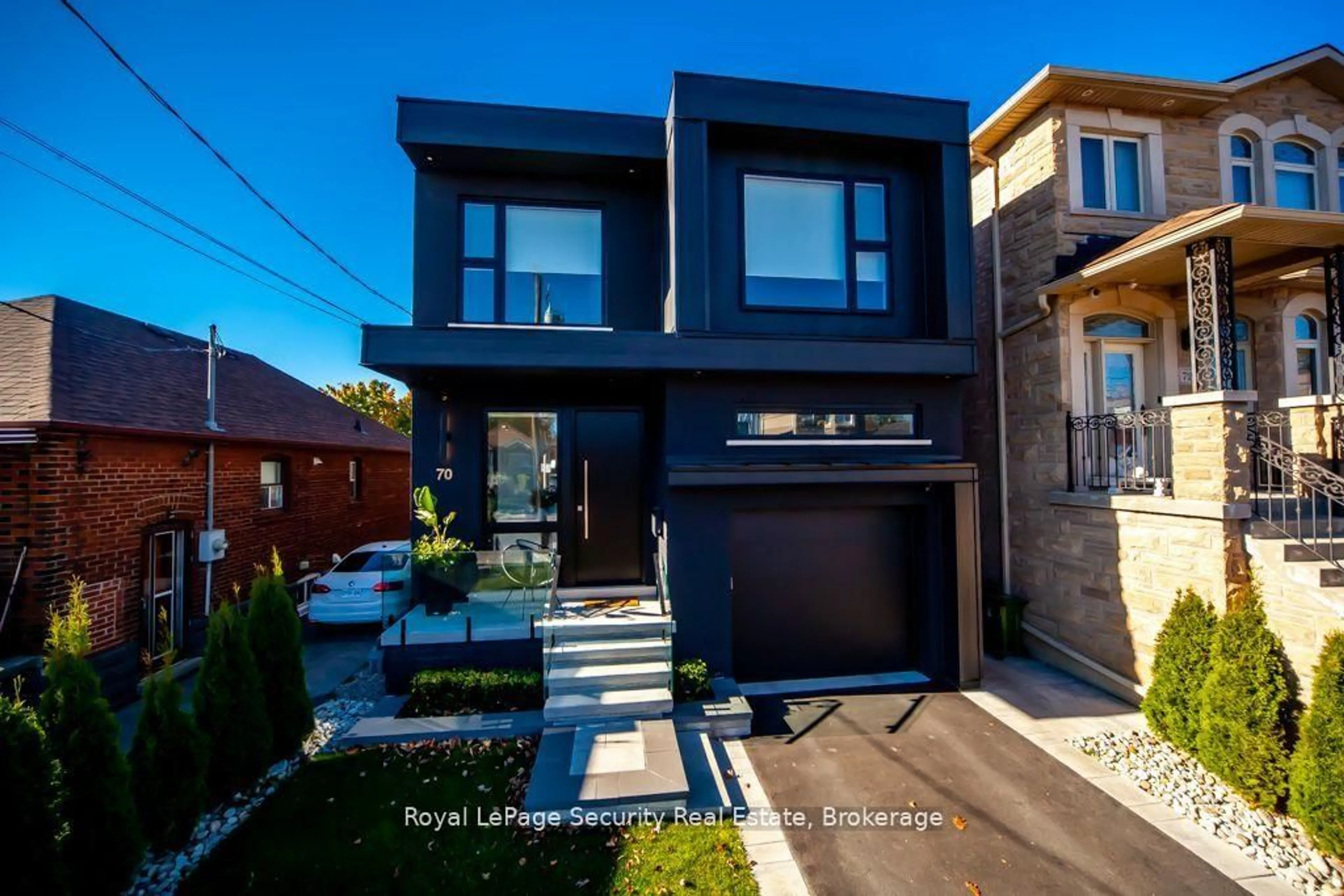 Home with brick exterior material, street for 70 Chamberlain Ave, Toronto Ontario M6E 4K1