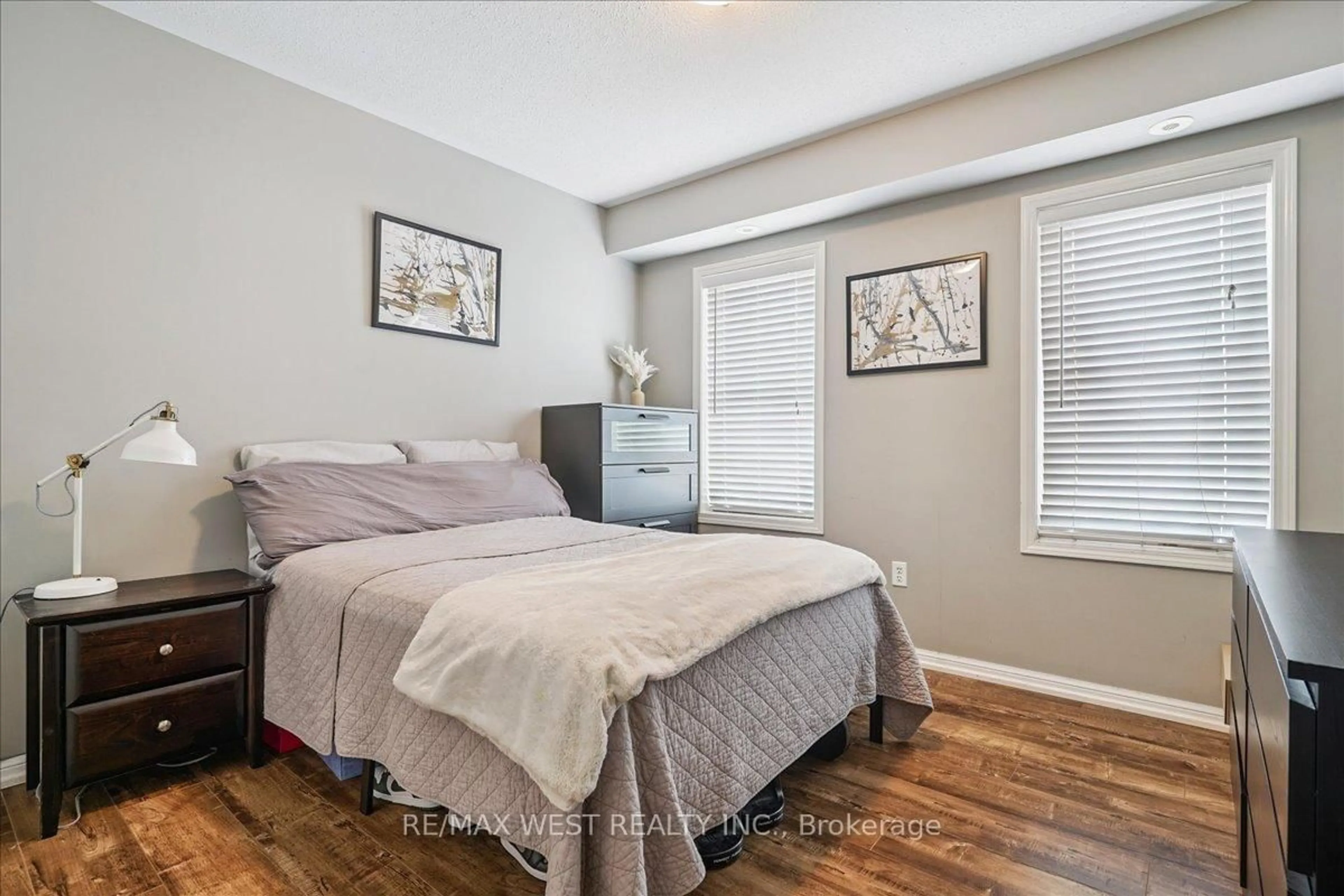 Bedroom with bed, wood/laminate floor for 790 Neighbourhood Circ #3, Mississauga Ontario L5B 0A6