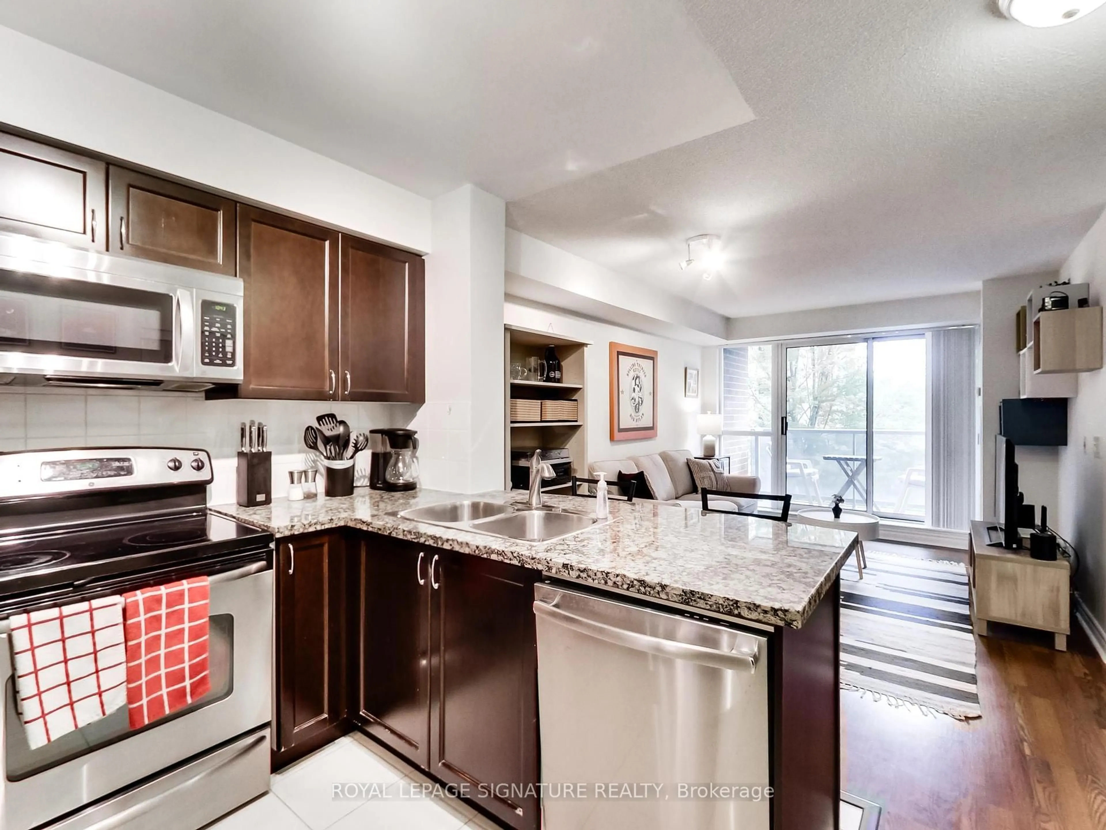 Open concept kitchen, ceramic/tile floor for 5 Michael Power Pl #309, Toronto Ontario M9A 0A3