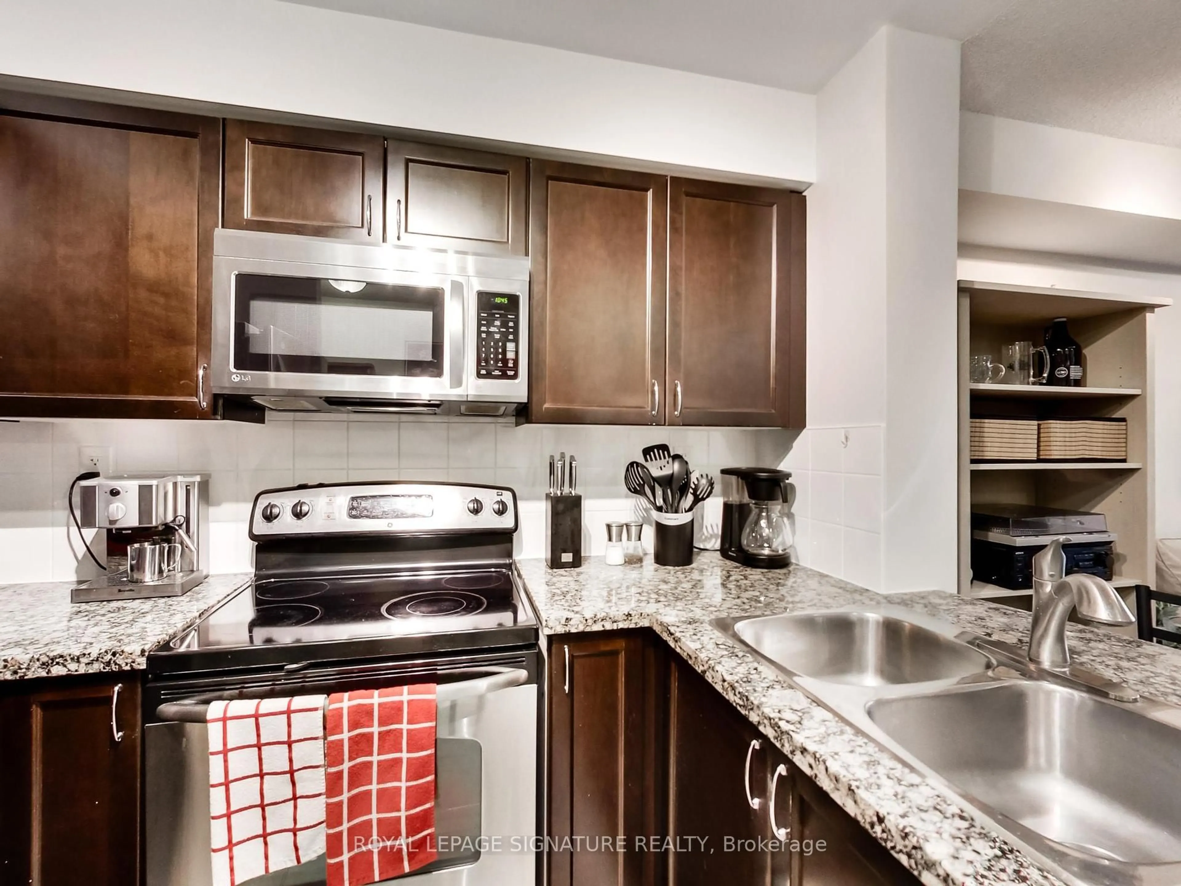 Standard kitchen, unknown for 5 Michael Power Pl #309, Toronto Ontario M9A 0A3