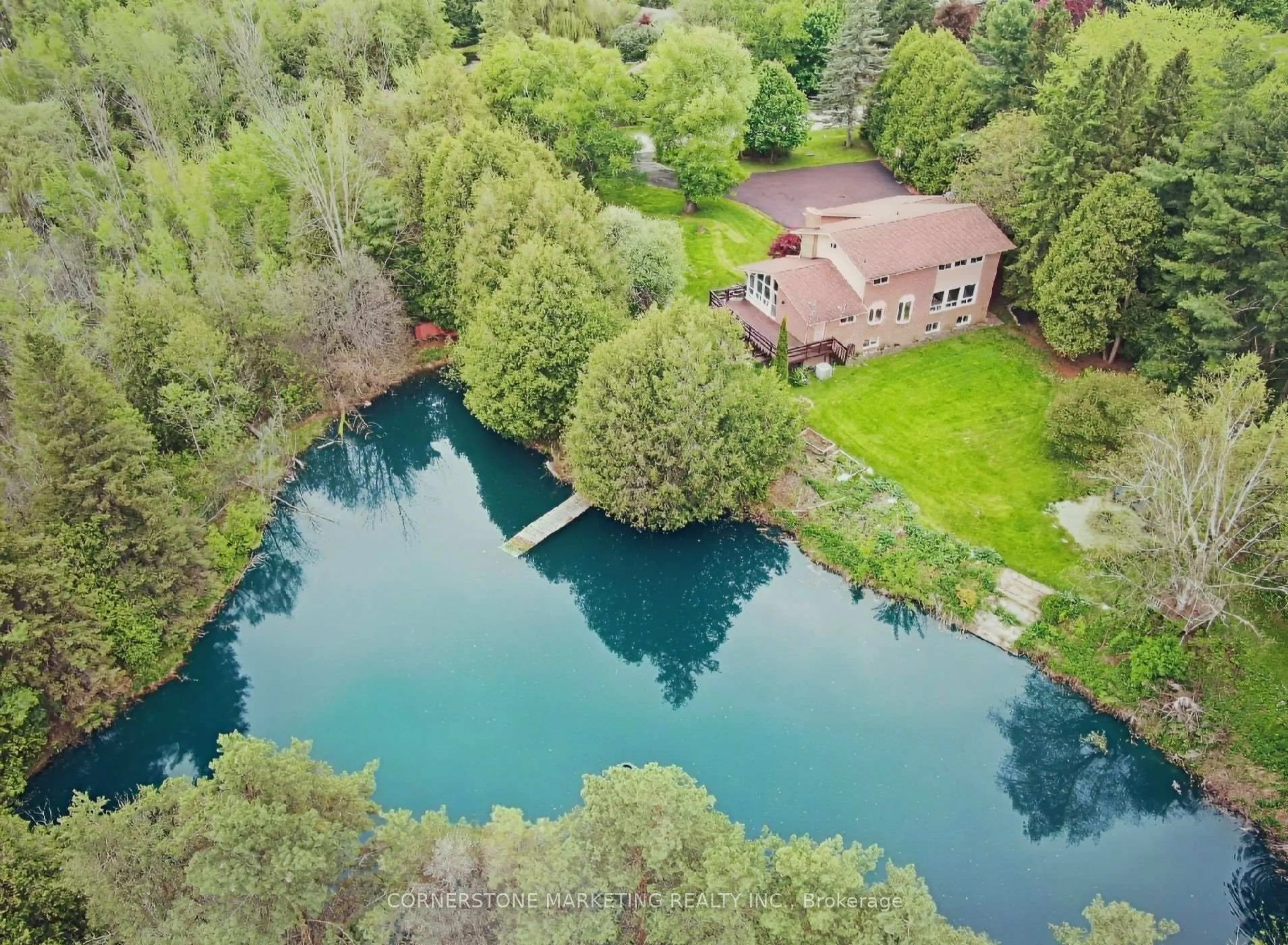 A pic from outside/outdoor area/front of a property/back of a property/a pic from drone, water/lake/river/ocean view for 1 Cedar Dr, Caledon Ontario L7K 1H4