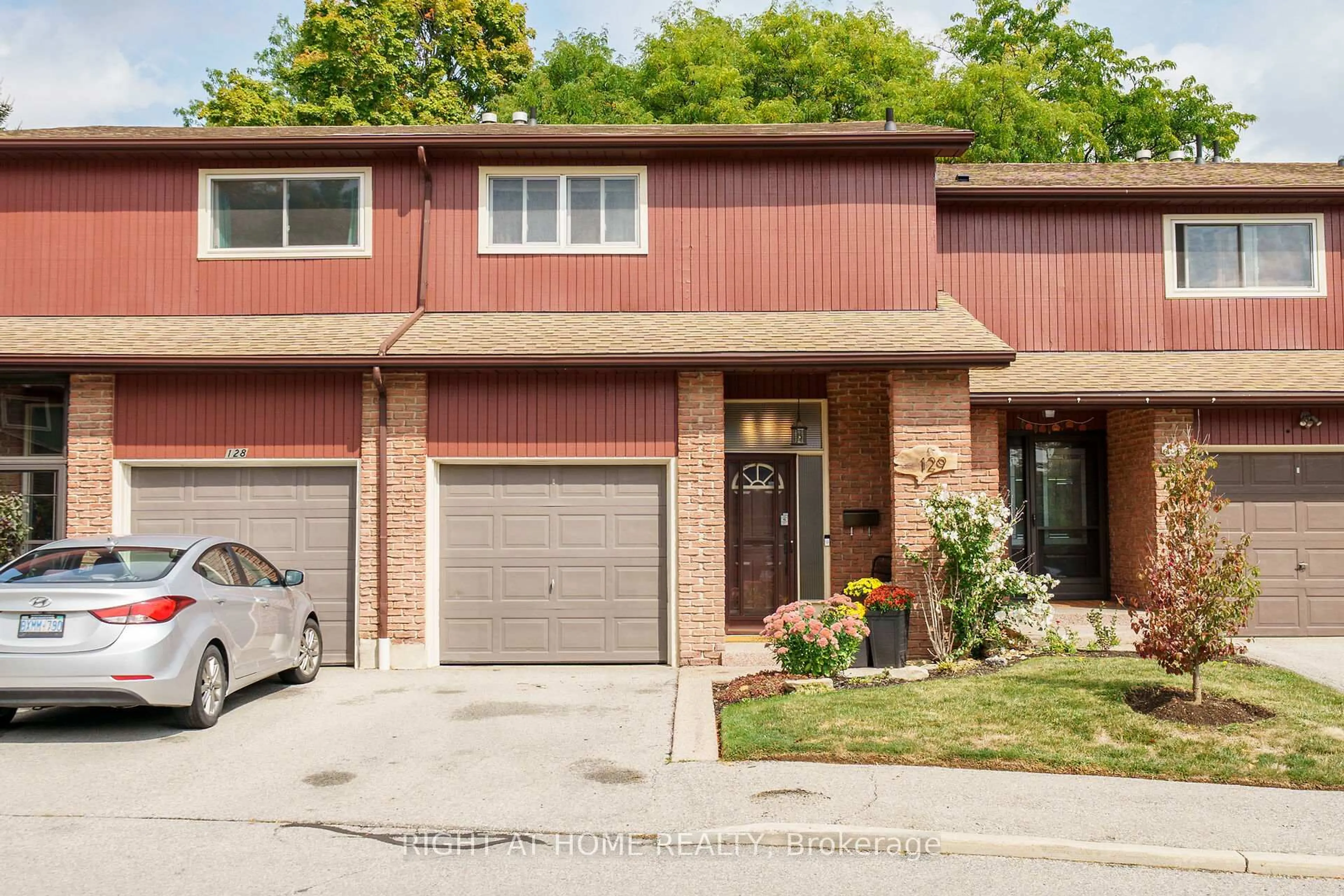 Home with brick exterior material, street for 2301 Cavendish Dr #129, Burlington Ontario L7P 3M3
