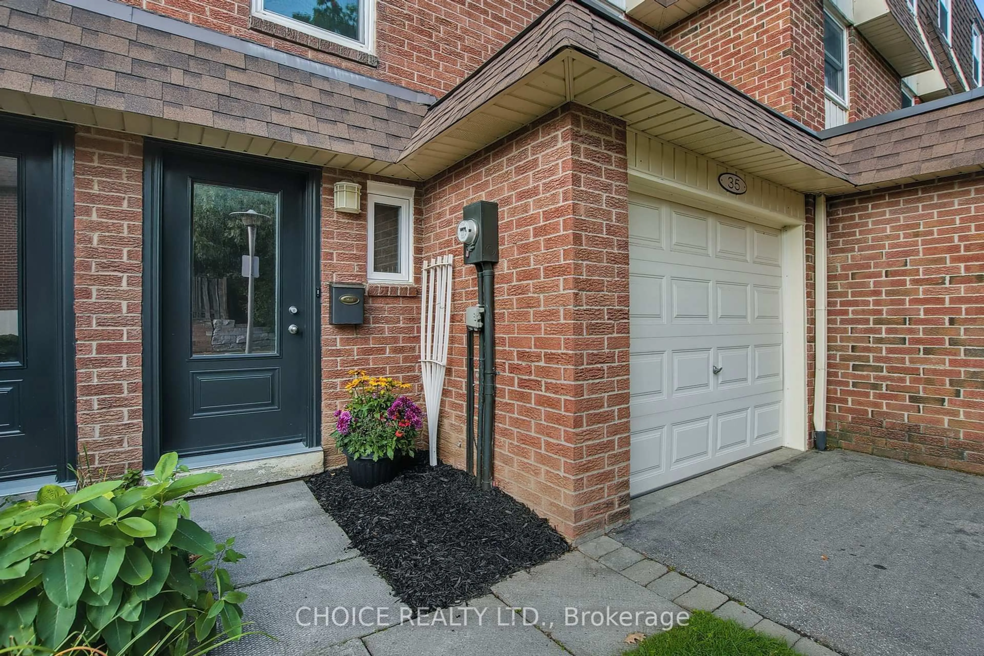 Home with brick exterior material, street for 30 Heslop Rd #35, Milton Ontario L9T 1B3