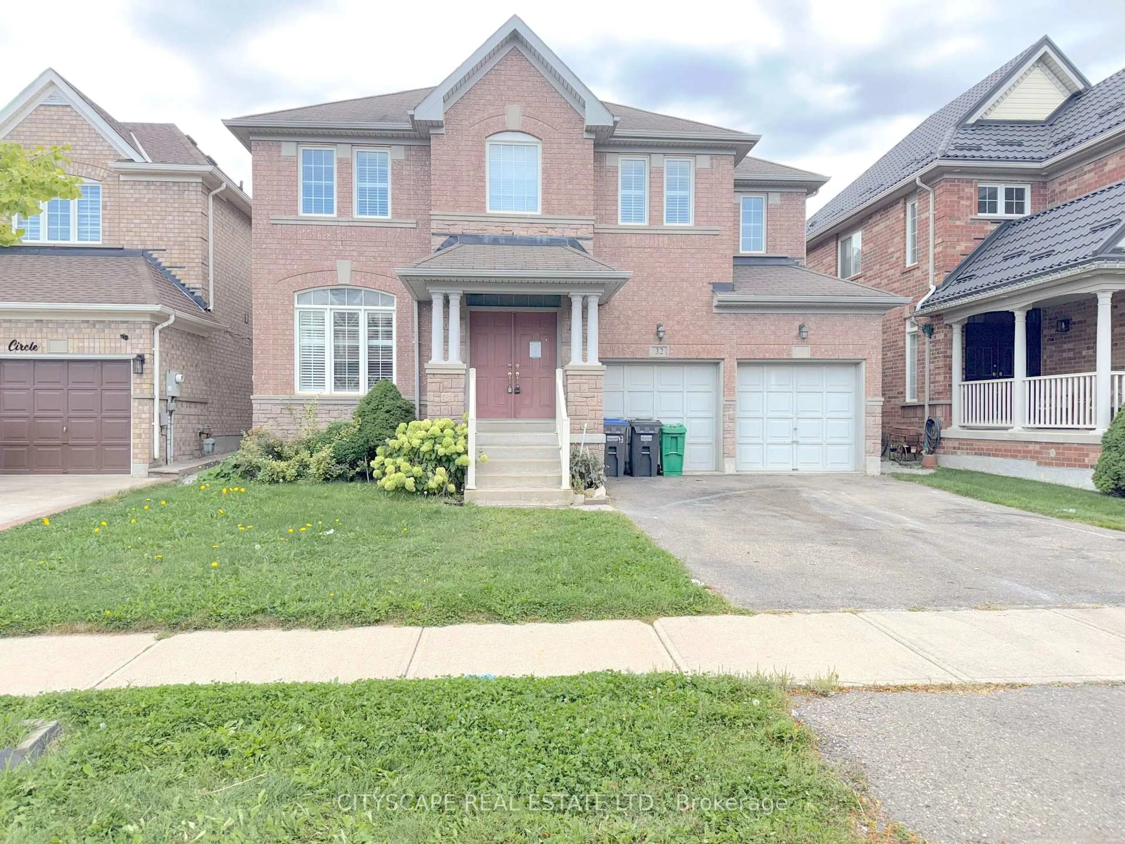Home with brick exterior material, street for 32 Tawnberry Circ, Brampton Ontario L7A 0J6