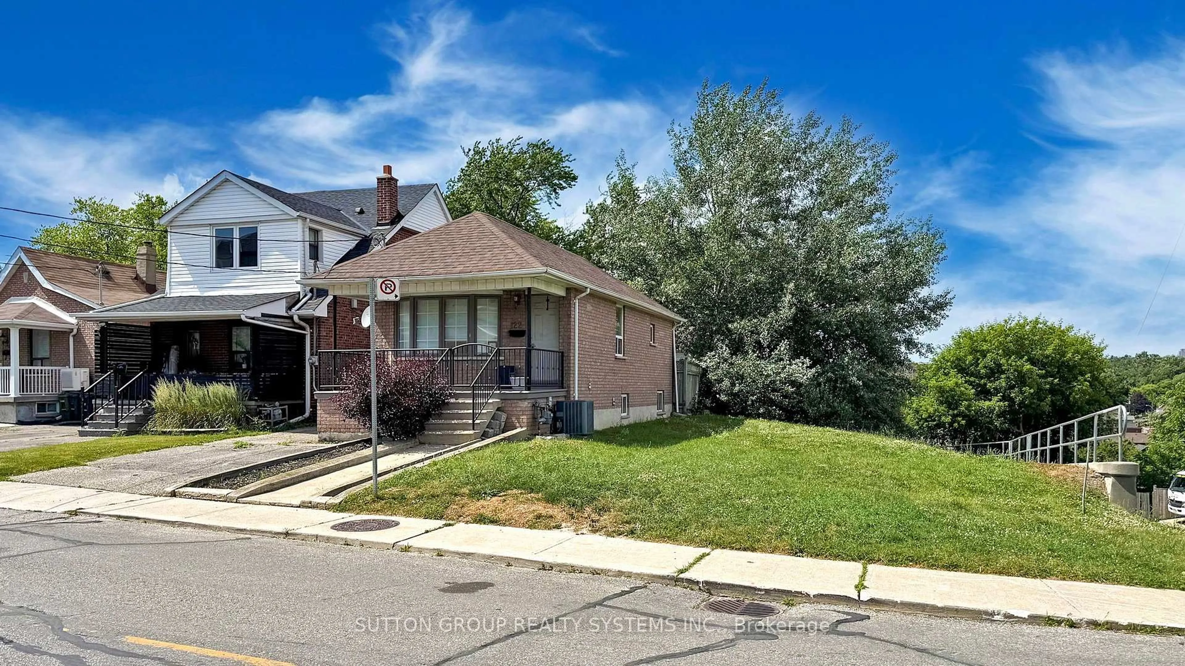 Home with brick exterior material, street for 122 Hatherley Rd, Toronto Ontario M6E 1W5
