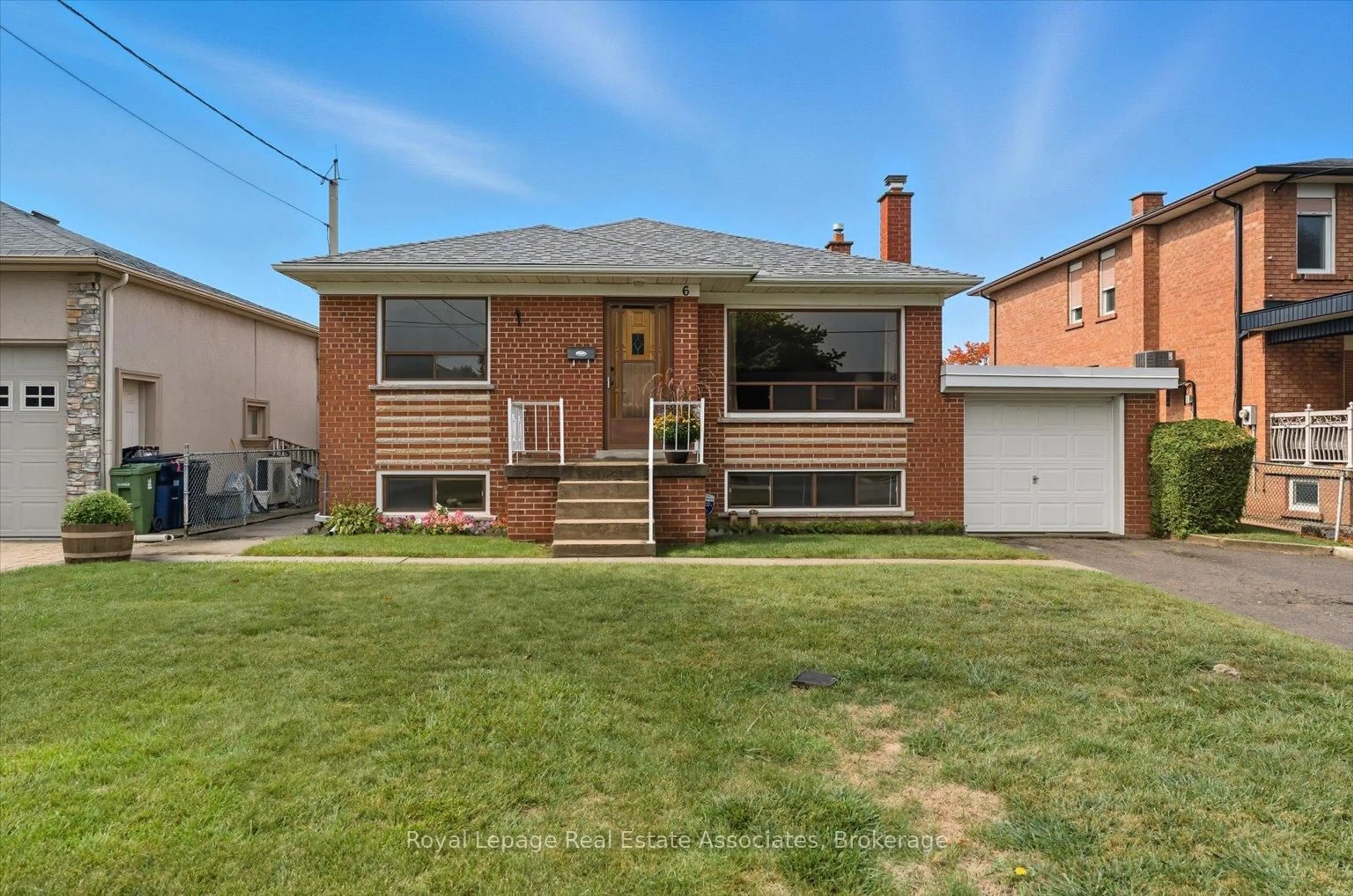 Home with brick exterior material, street for 6 Berryton Ave, Toronto Ontario M6L 2X8