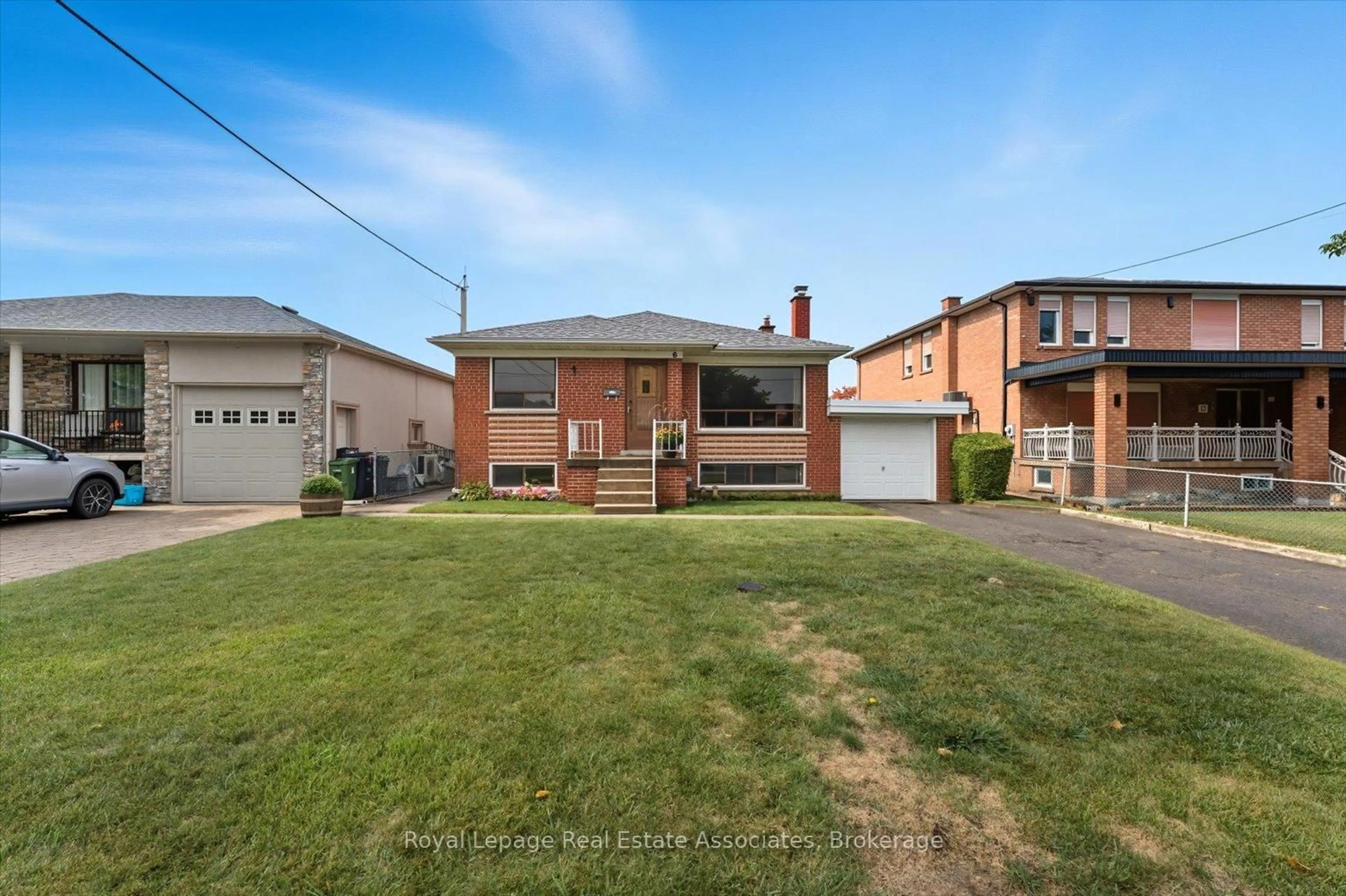 Home with brick exterior material, street for 6 Berryton Ave, Toronto Ontario M6L 2X8